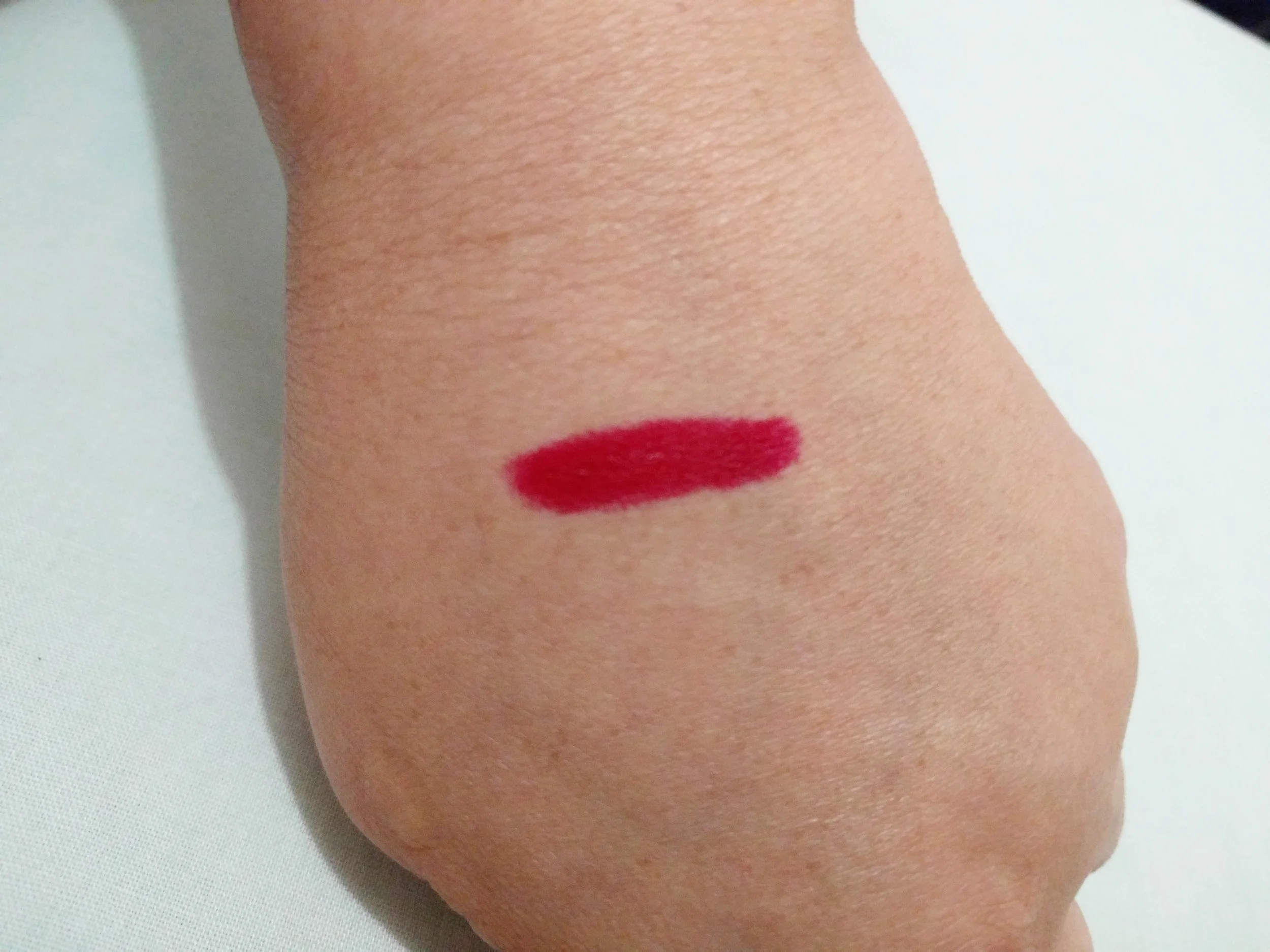  Swatch of Happy Skin x Disney Princesses Moisturizing Matte Lippie in Snow White