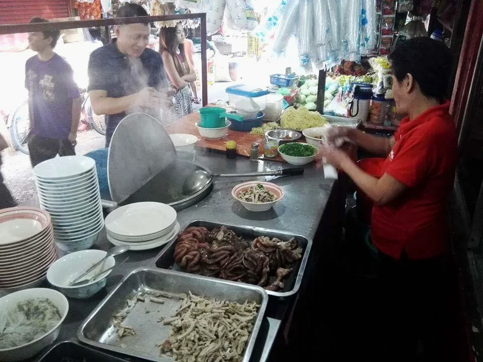 Pots of broth are kept hot outside Netong's at La Paz market. Ingredients are assembled upon order.
