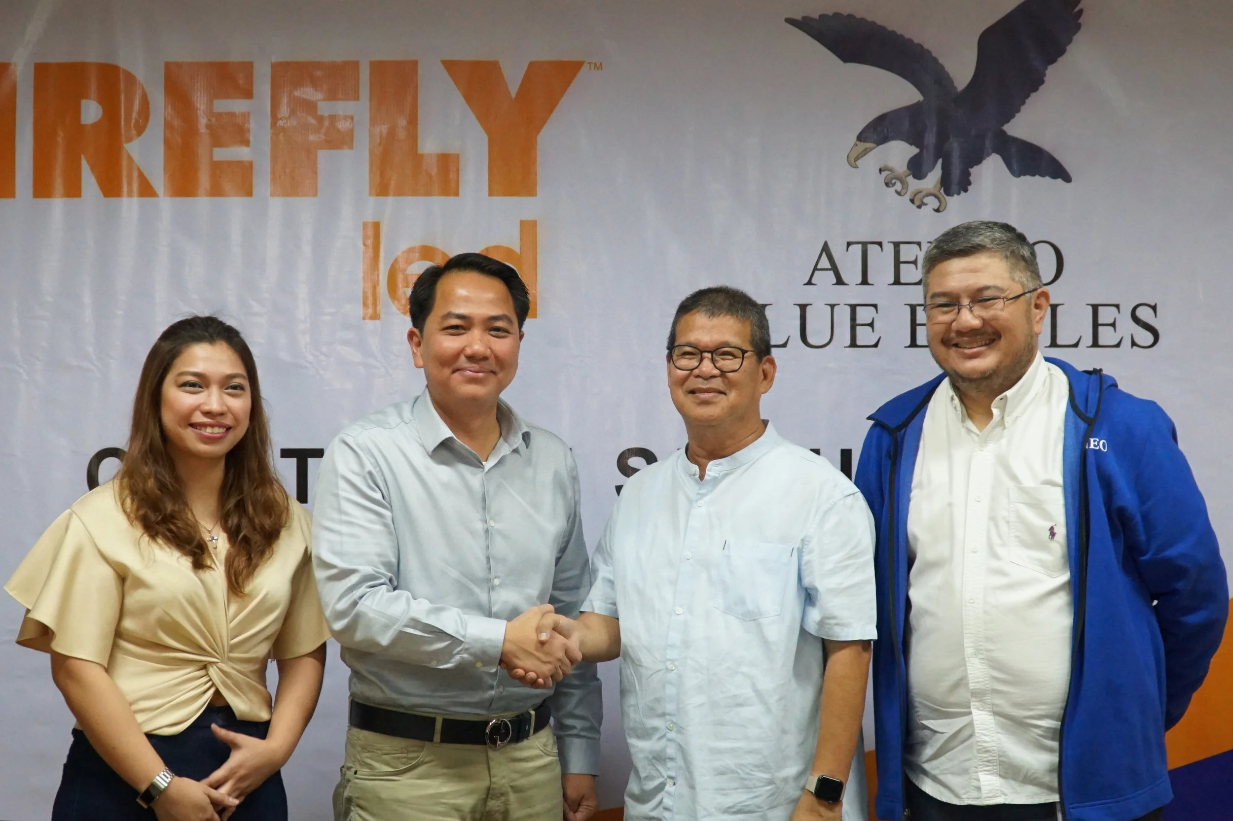Firefly LED seals the deal with Ateneo's University Athletics' Fr. Nemesio S. Que SJ and Emmanuel T. Fernandez.jpg