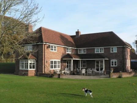 This new house stands in open countryside, but is a replacement dwelling sited largely on the footprint of a dilapidated cottage. The owner had very specific requirements including looking to achieve triple aspect from all of the main rooms.