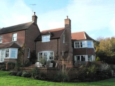 The Planning Authority accepted there was a significant planning gain by removal of the outbuildings, thus permitting a greater area of new building in the form of a number of extensions.