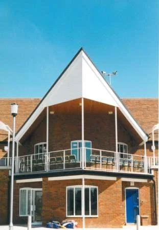 Sports pavilion with changing and social facilities at a major RAF station in Buckinghamshire.
