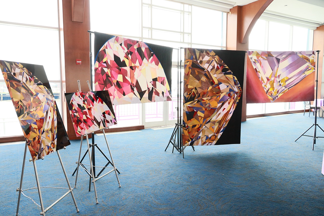 gemstone quilt artwork display at WJA exhibit in New York City