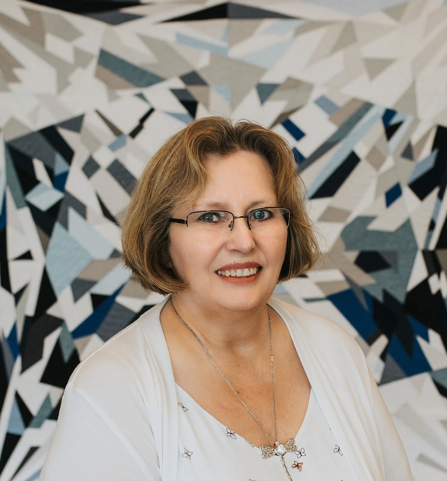 Matthie Debbie and quilt final.jpg