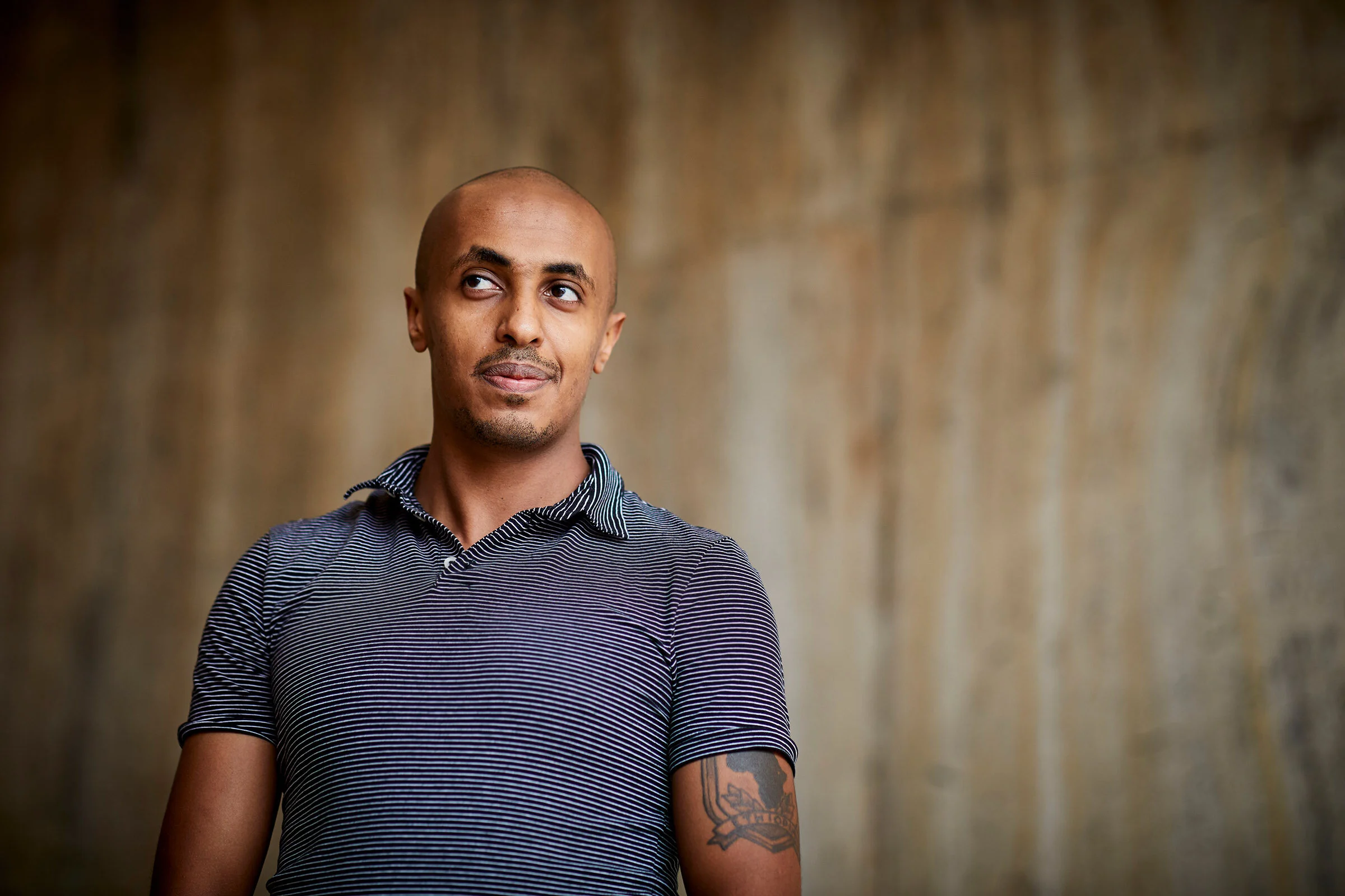  Matheos Mesfin, founder of IEA Councils, in his office in Washington, D.C. Image made for Grinnell College. [copyright Matthew Rakola] 