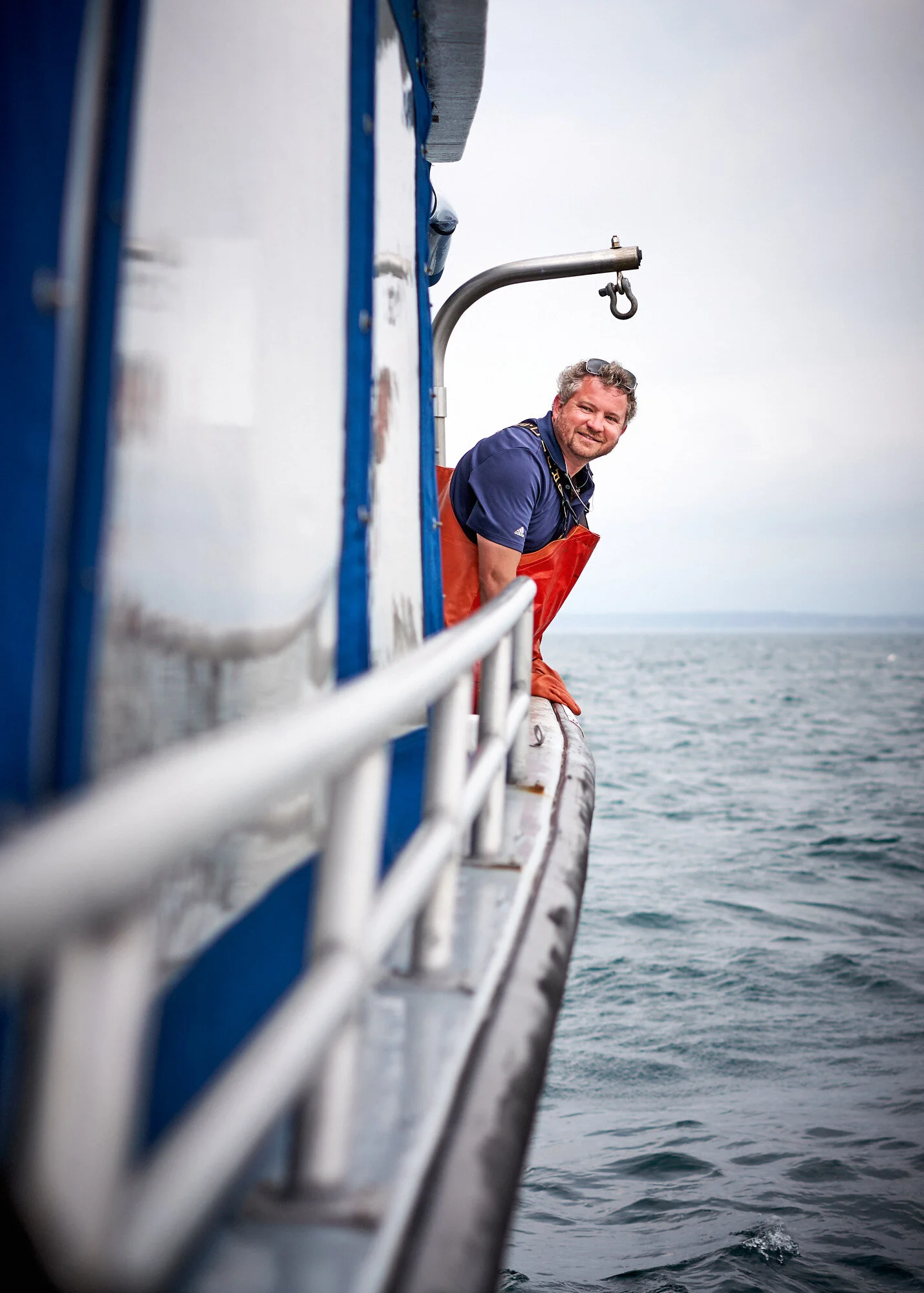         Aboard the Miss Samantha, fff the coast of Mt. Desert Island, Maine. Copyright Matthew Rakola.         