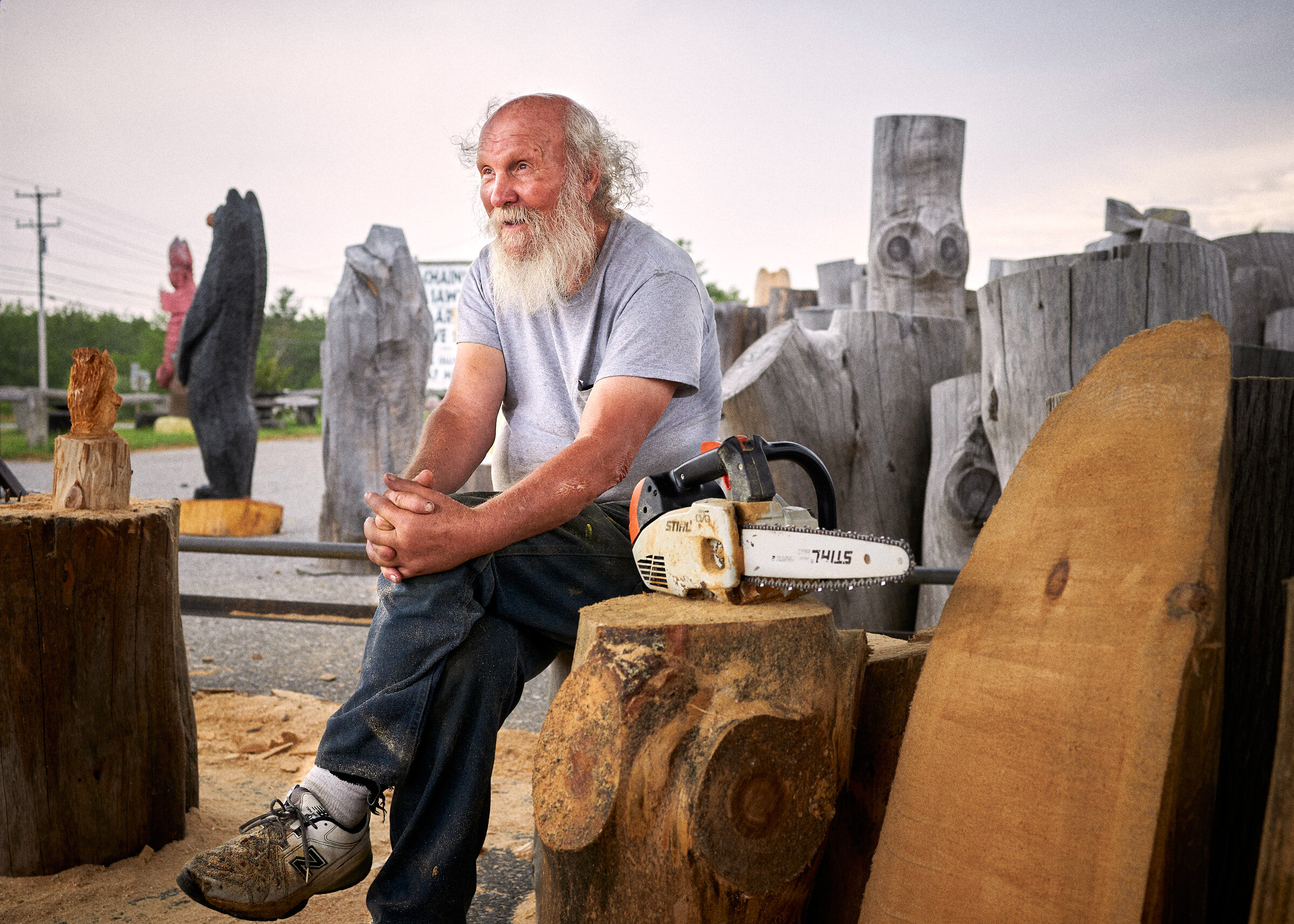  Portrait of Ray Murphy , "The Chainsaw Sawyer Artist" and "The Founder of Chainsaw Art" at his shop in Hancock, Maine. Image © Matthew Rakola 