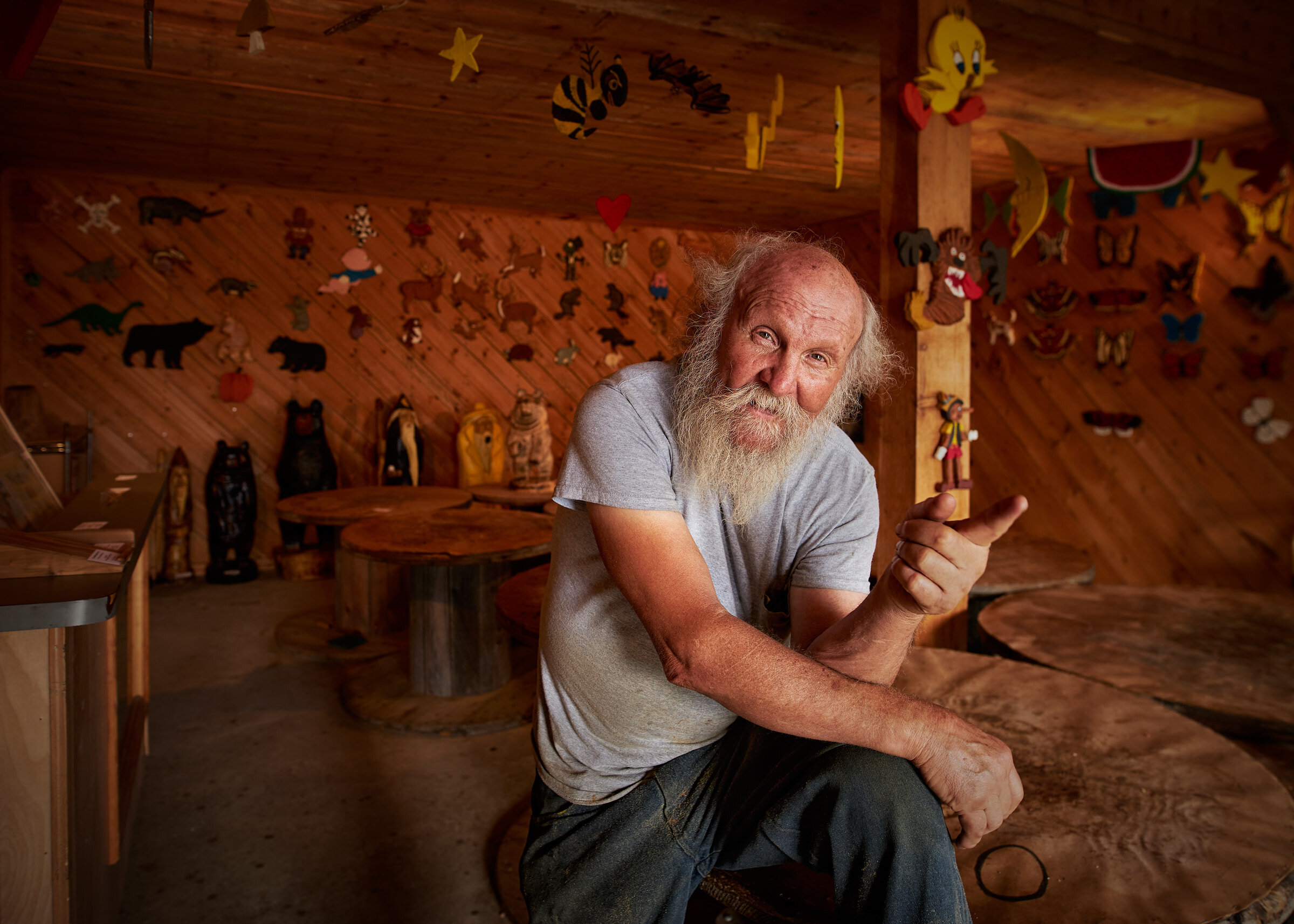  Portrait of Ray Murphy , "The Chainsaw Sawyer Artist" and "The Founder of Chainsaw Art" at his shop in Hancock, Maine. Image © Matthew Rakola 