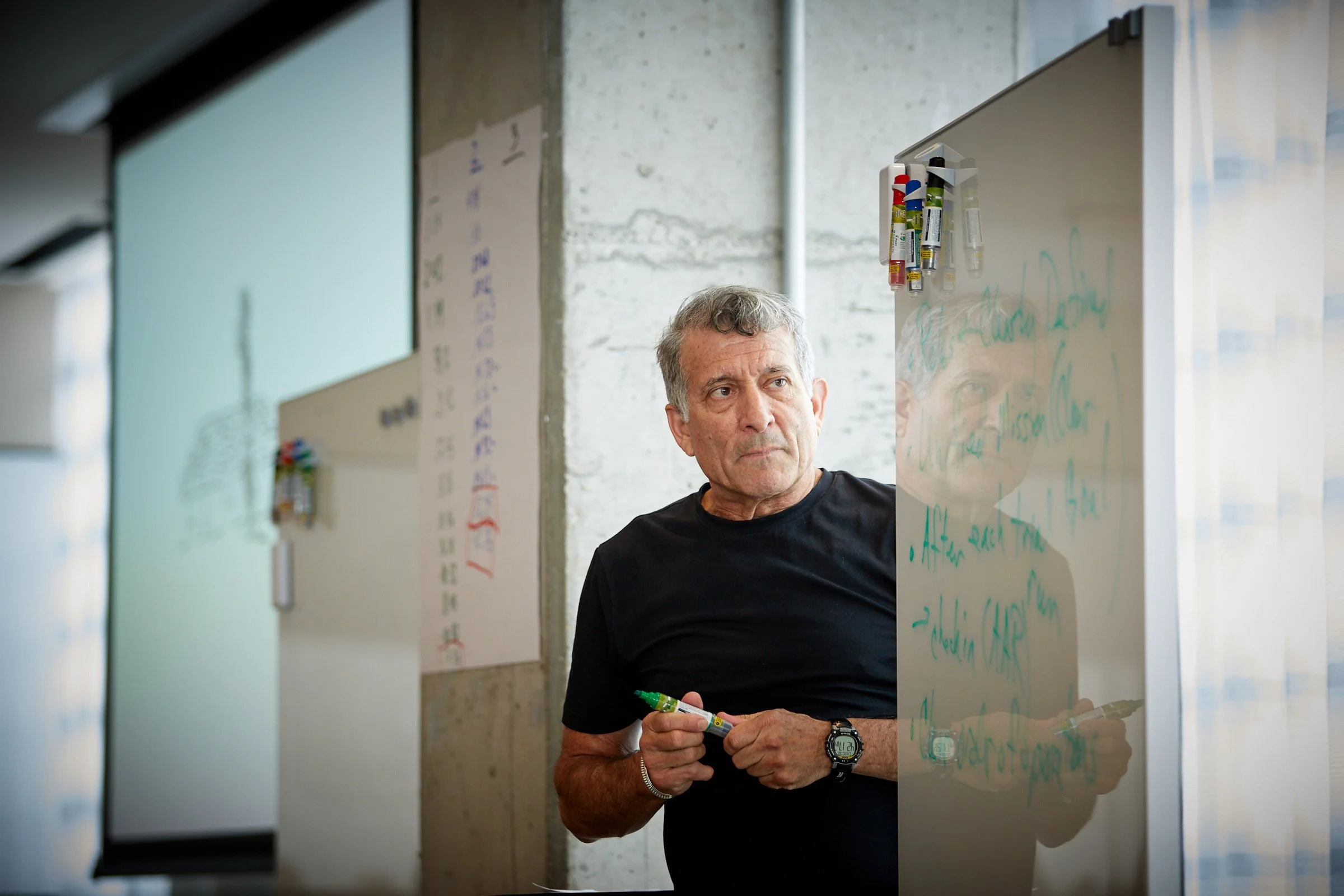 Man at a white board