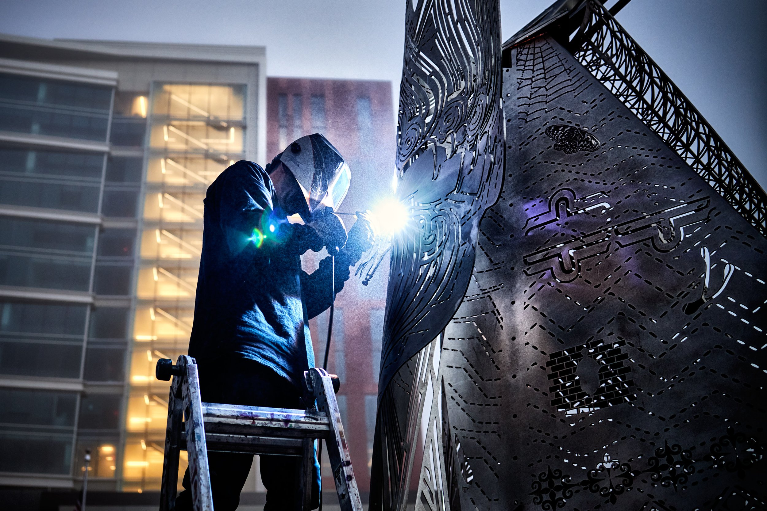  Installation of "Meet Me at the Triangles" public art piece on October 22, 2020. [Image copyright Matthew Rakola. Use only with permission.] 