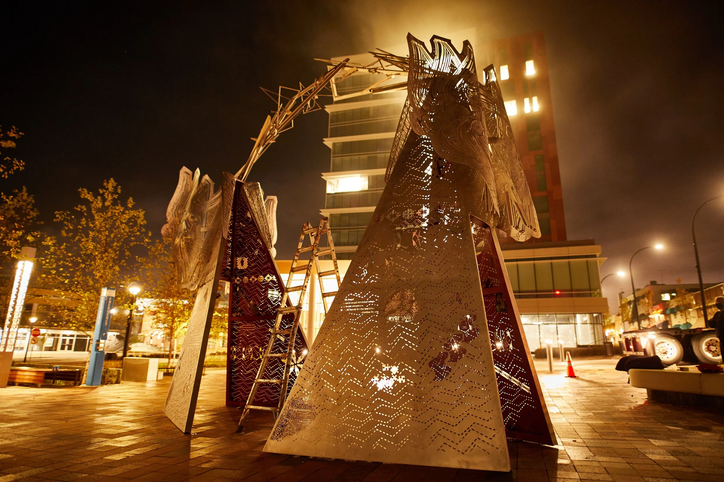 Installation of "Meet Me at the Triangles" public art piece on October 22, 2020. [Image copyright Matthew Rakola. Use only with permission.] 