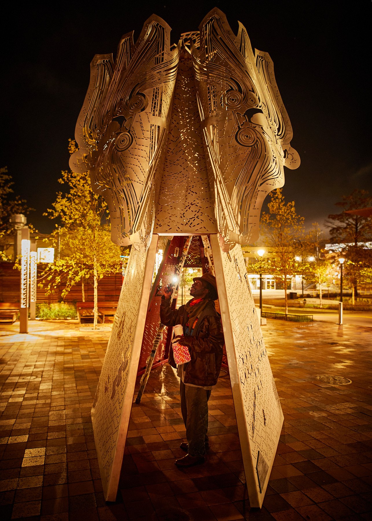  Installation of "Meet Me at the Triangles" public art piece on October 22, 2020. [Image copyright Matthew Rakola. Use only with permission.] 