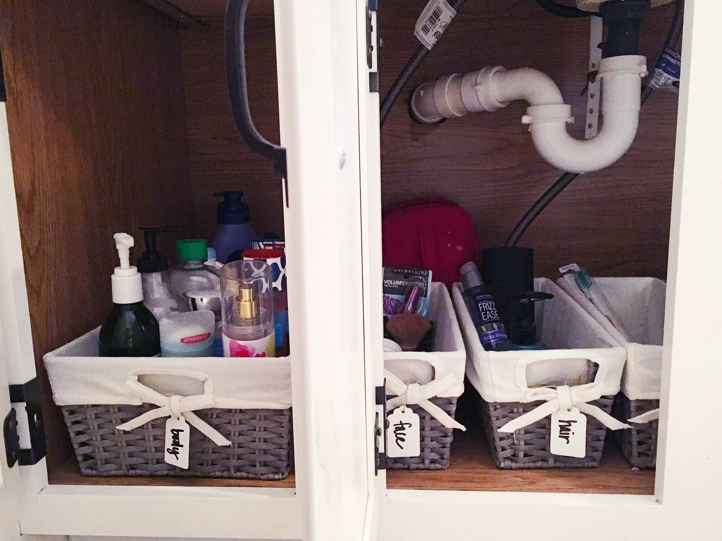 Organized Simplicity Client Spaces Bathroom Cabinets