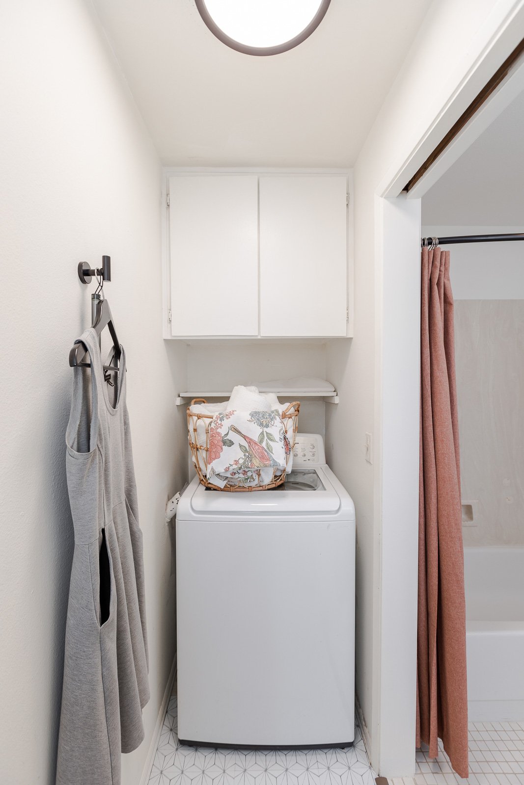  Laundry room includes a full size washer &amp; dryer and plenty of storage.    