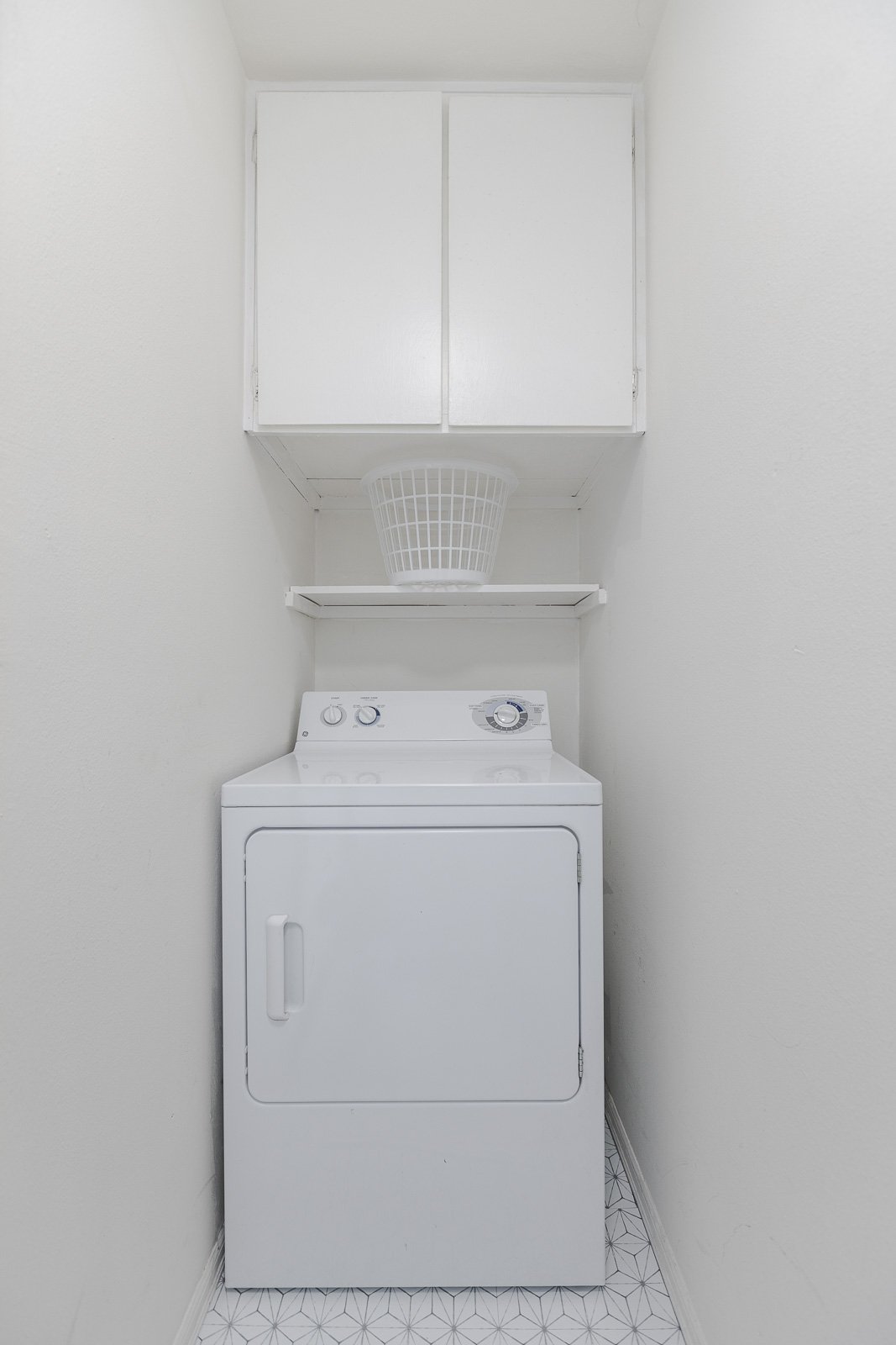  Laundry room includes a full size washer &amp; dryer and plenty of storage.    