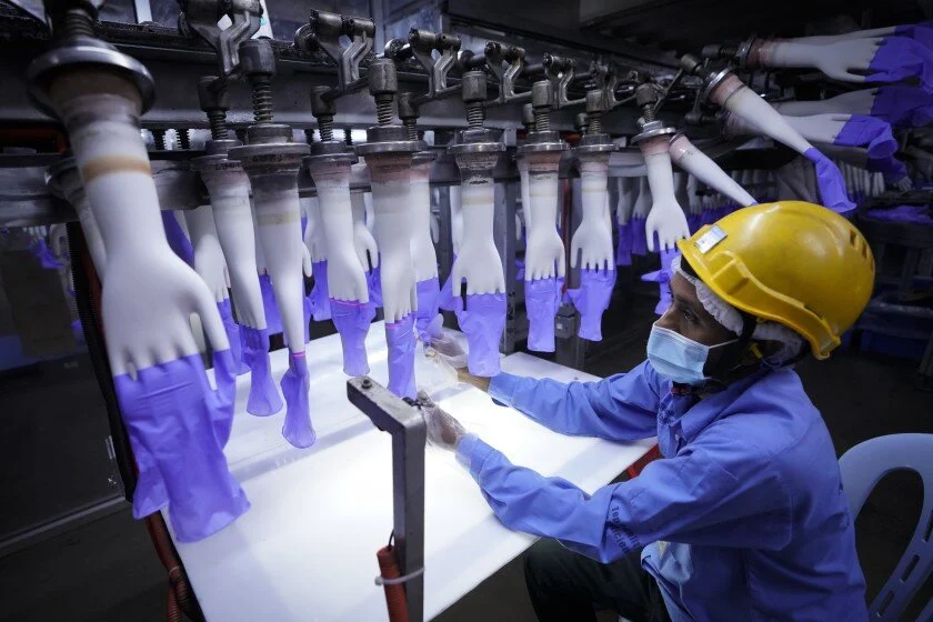 Los Angeles Times: These gloves help fight COVID-19. But they’re made in sweatshop conditions