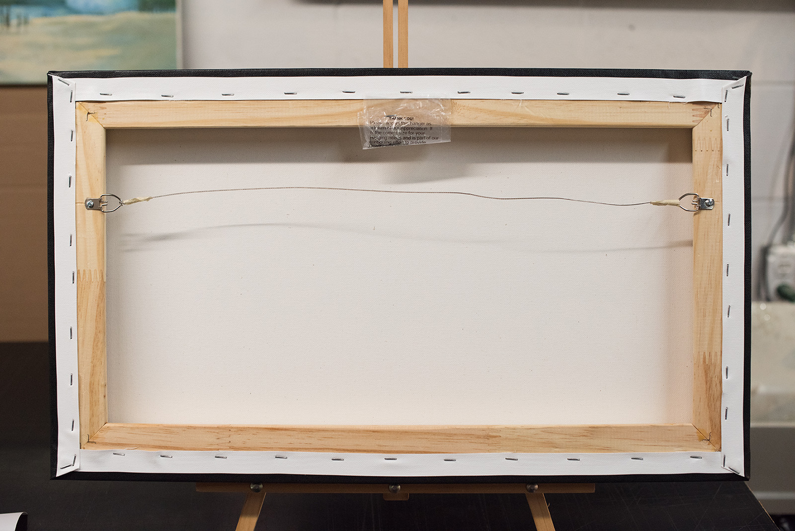 The back of one of our Giclee Prints - optional hardware available.