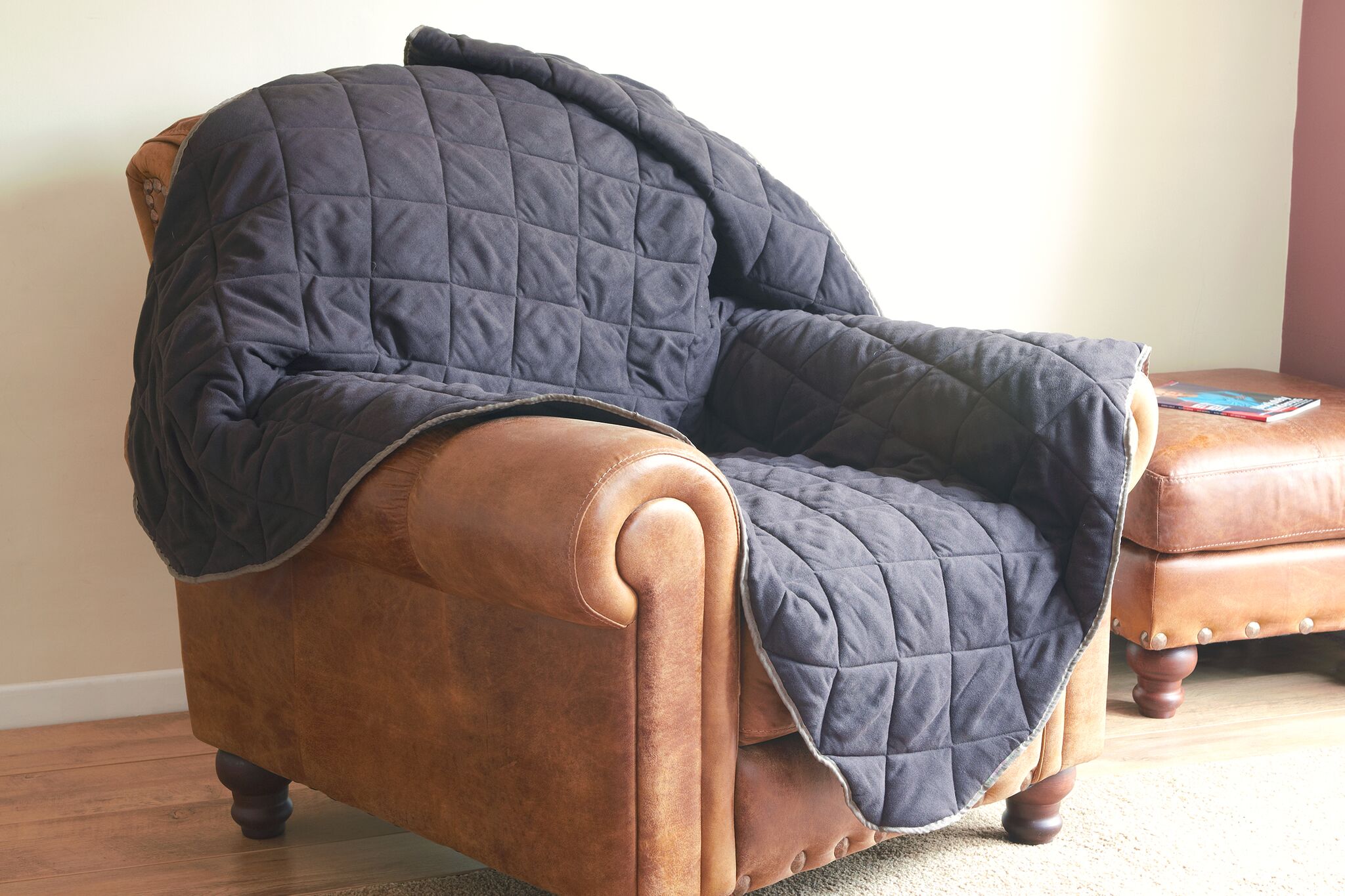 Deluxe throws for your chair or a larger one for your sofa, available at the Raffles Shop.