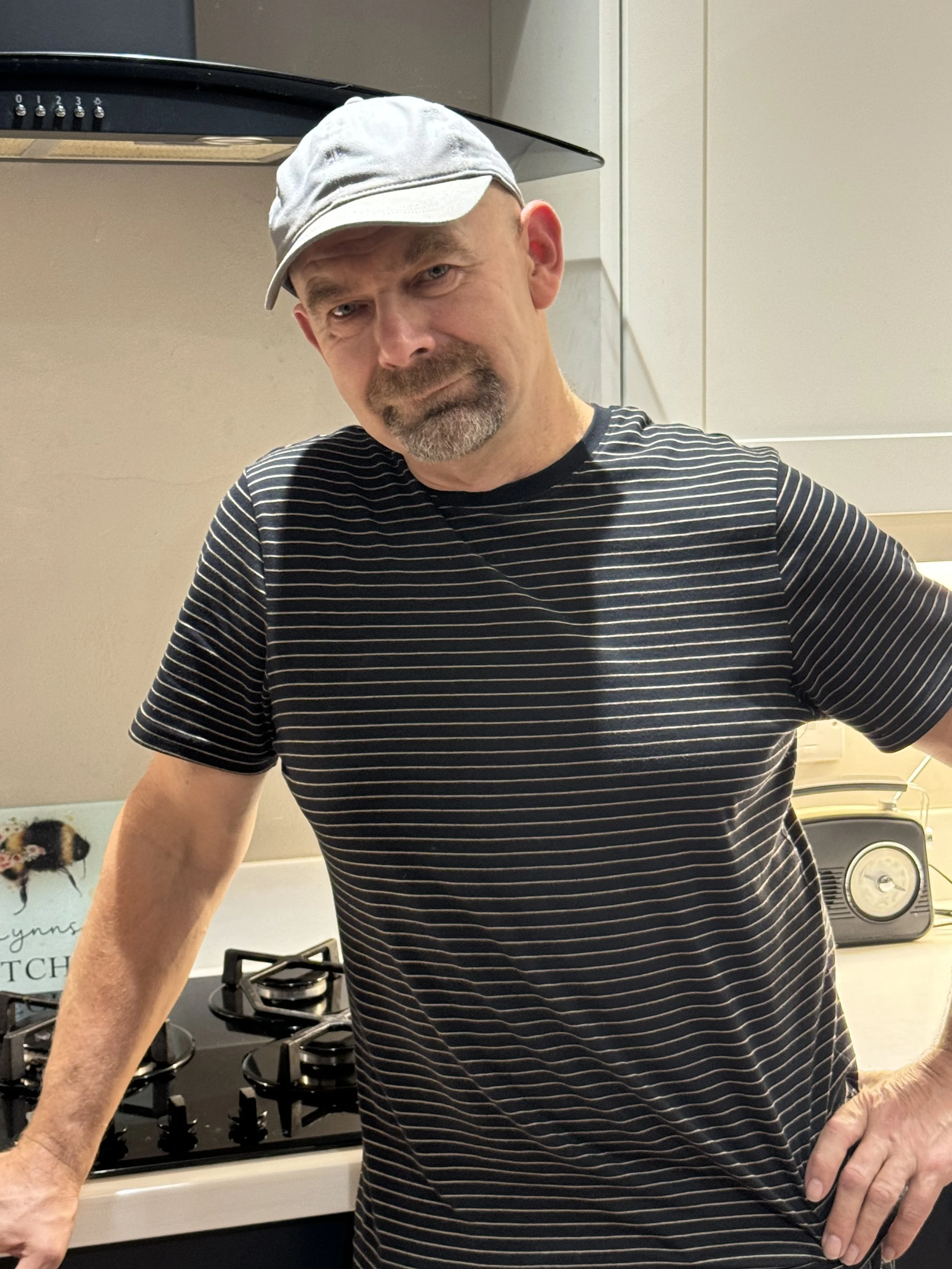 <img src="image.jpg" alt="Tony Rose Kitchen Designer>.