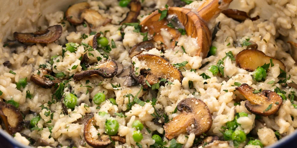 Mushroom Risotto - Mushroom risotto is one of my favorite meals. If you have a picky eater you can leave out the mushrooms and peas as they get added in at the end. I add roasted chicken for the meat eaters (I either roast one at the beginning of the week or pick up an organic rotisserie for $10-$12). Serve with salad and garlic bread to make it extra yum. Tip: Trader Joe's sells frozen Mushroom Risotto, but note that you won't be able to modify it as it is pre-made.