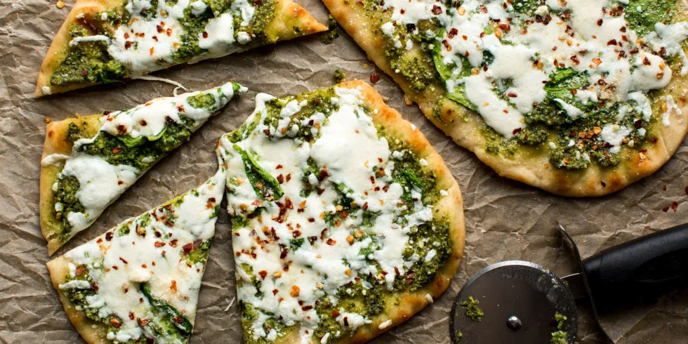 Pesto and Spinach Flatbread - This recipe is a great alternative to pizza for dinner, but if you have picky kids you can easily throw in a crust with pizza sauce and cheese. The kids get homemade pizza (have them make it with you) and the adults don't have to eat Cheese Pizza for dinner. I add a salad on the side for this one too. Tip: Buy pre-made pesto if you need to cut prep-time. 