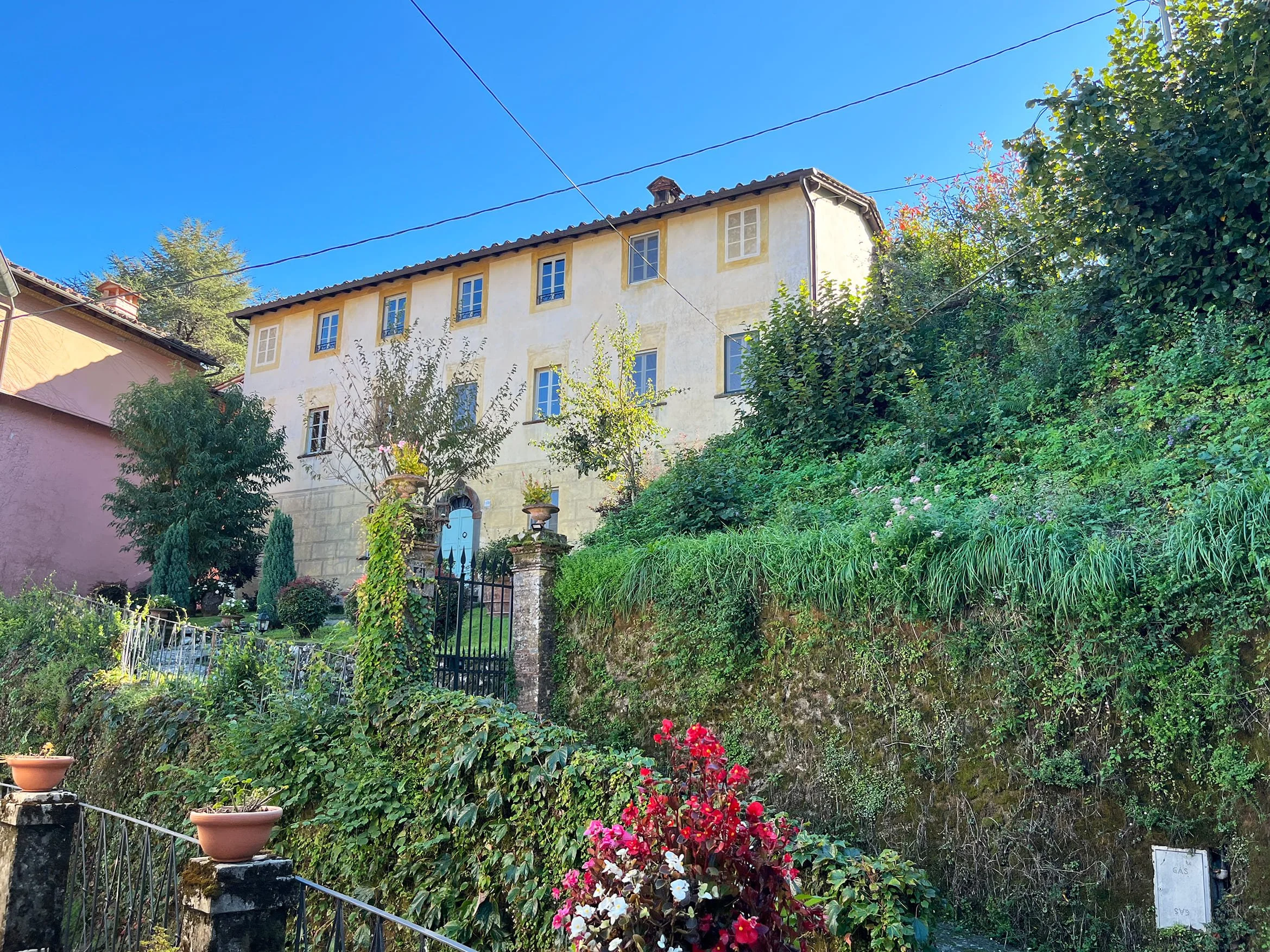 A large villa seen from a distance