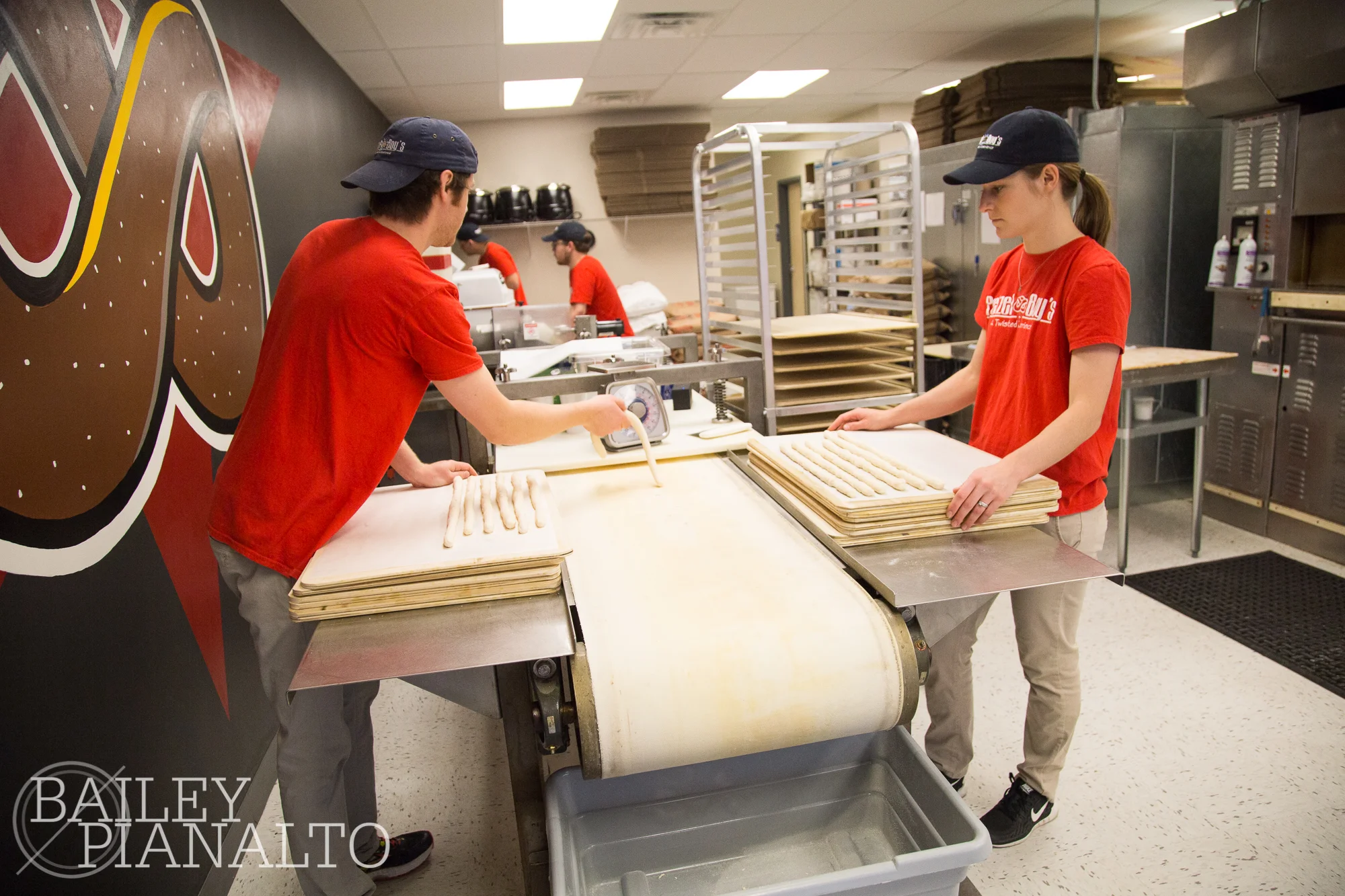 Dan and Andrea collecting dough from the extruder to make nugs.