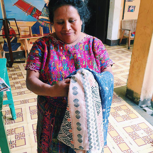 Caption: Handwoven textiles for Estrella de Mar Carry All bags .