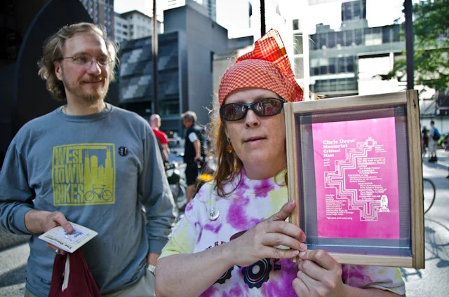 Chicago Daley Plaza/Picasso. over 500 rode in Memorial Critical Mass Tribute to Chris Drew. above. Jenny silkscreens patches for the ride.
