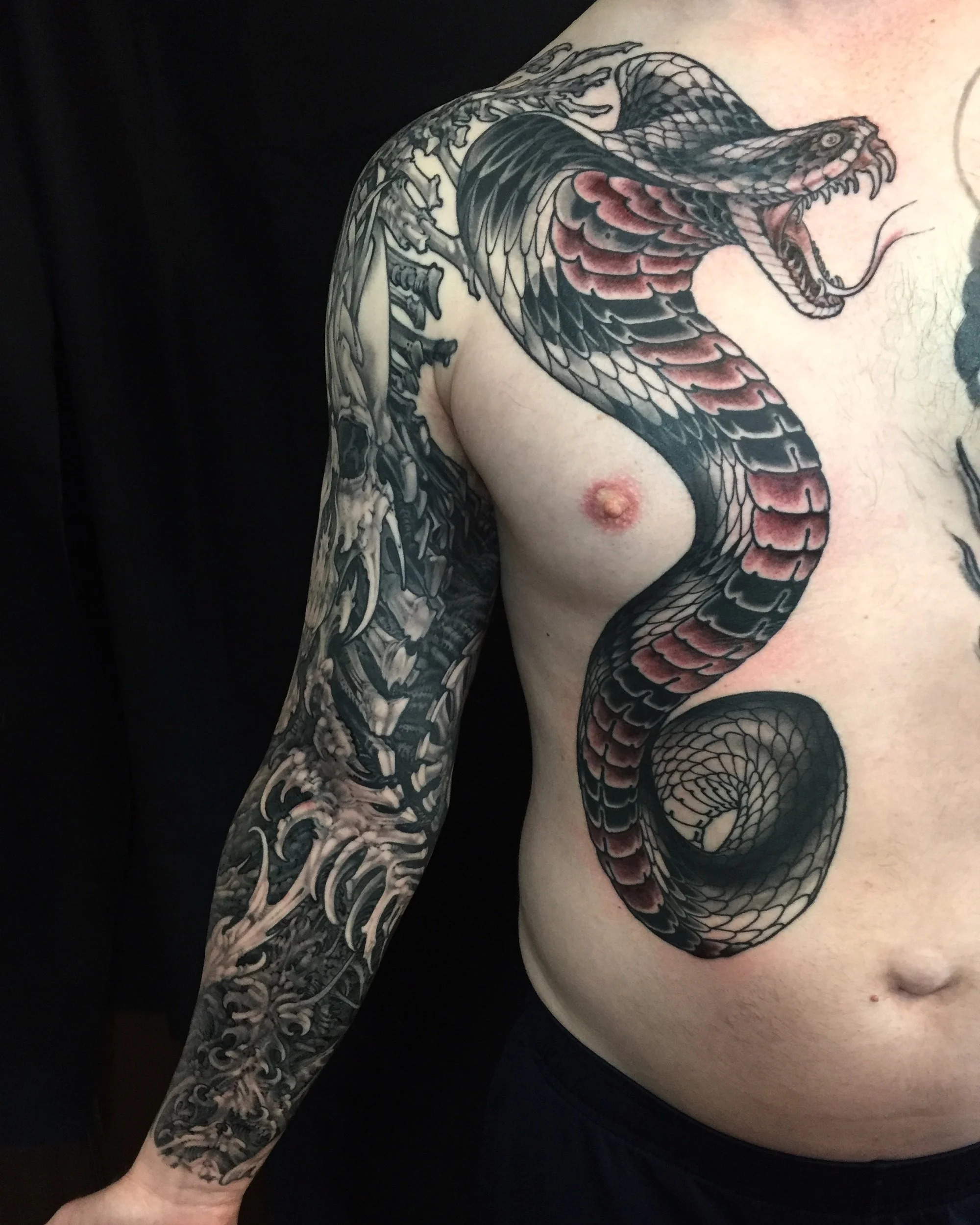 tampa florida biomechanical sleeve and snake tattoo