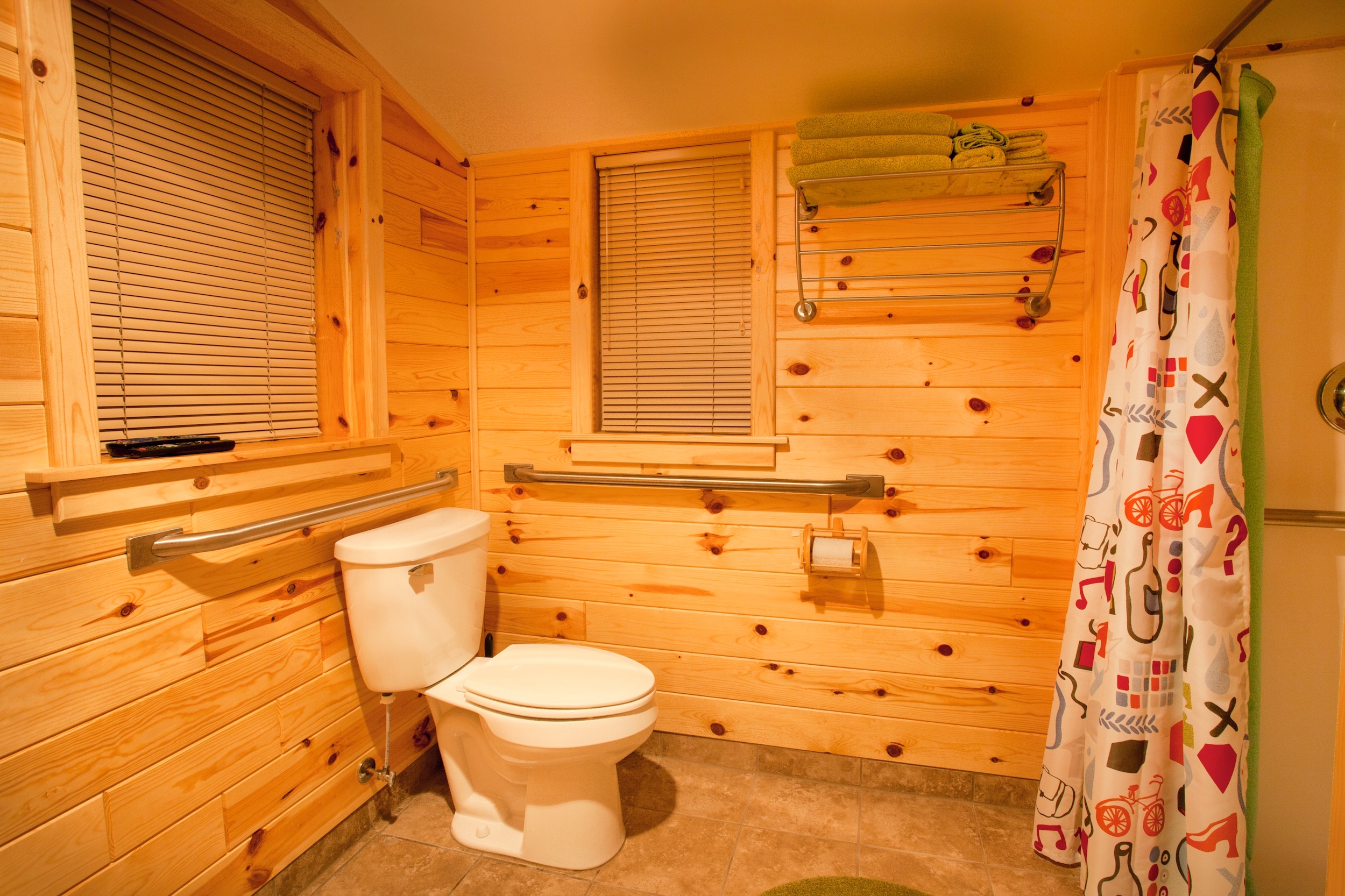 A great handicap accessible bathroom, clean, neat, bright and spacious. Check out the cool paper holder, it is the little extras that make a stay here so sweet. No need to bring towels, wash clothes, sheets or linens, they are all here for your comfort.