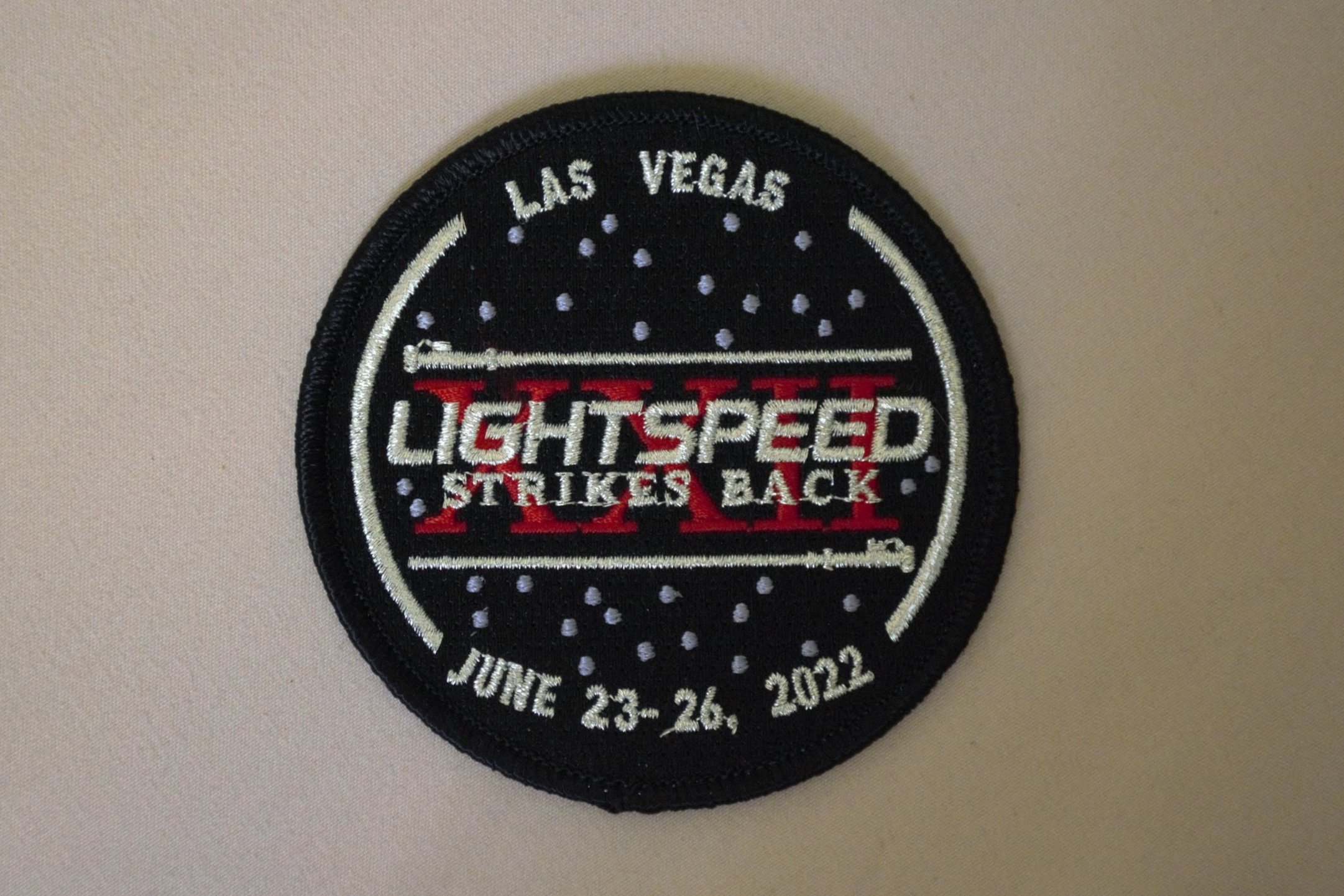 LIGHTSPEED STRIKES BACK COMMEMORATIVE BADGE