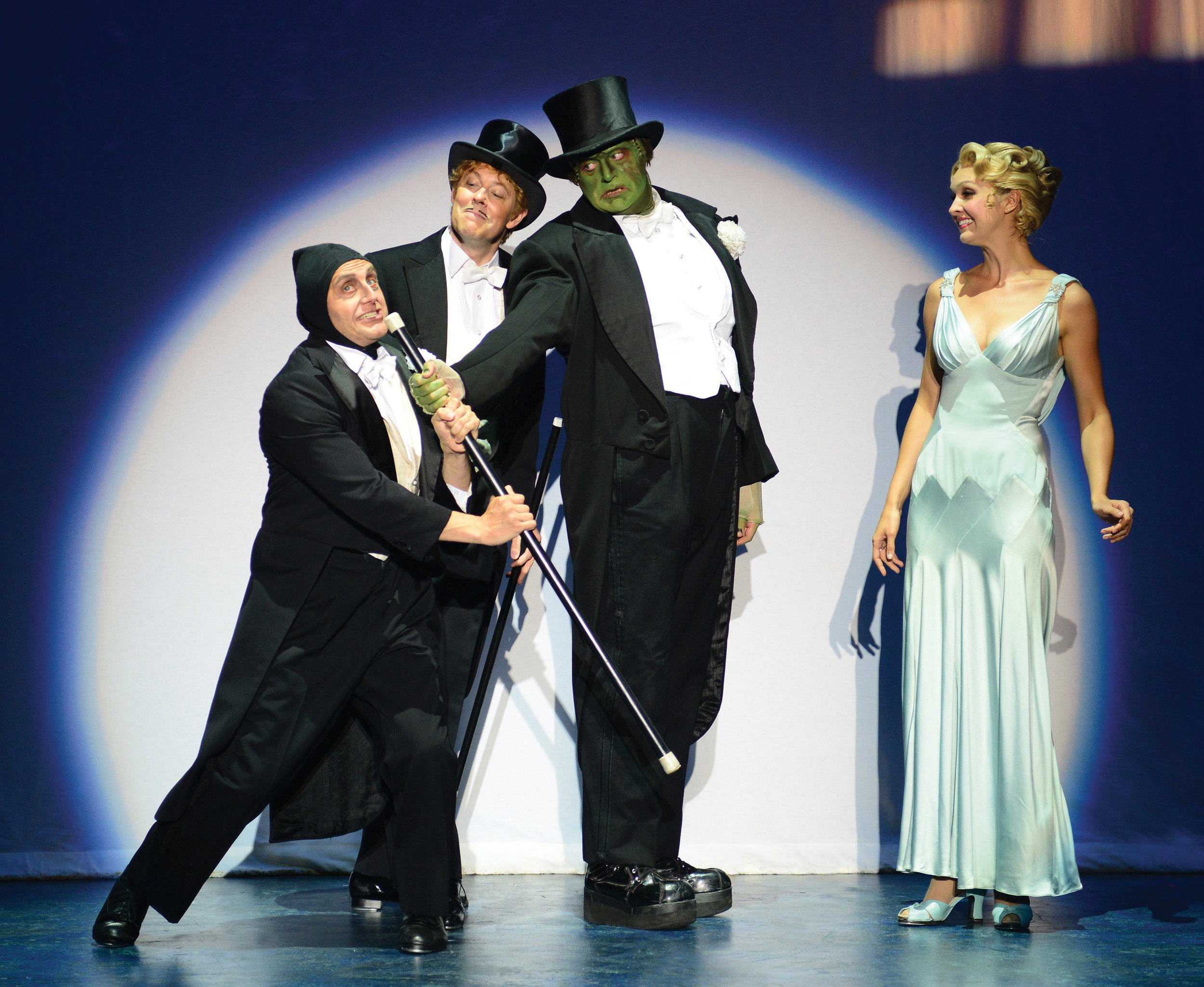 2013_OP_Young-Frankenstein_Nathan-Klau_as_Igor_John_Bolton_as_Frankenstein_Brad-Nacht_as_The-Monstor_Lara-Seibert_as_Inga_photo-by_Gary-Ng_CMYK_cropped.jpg