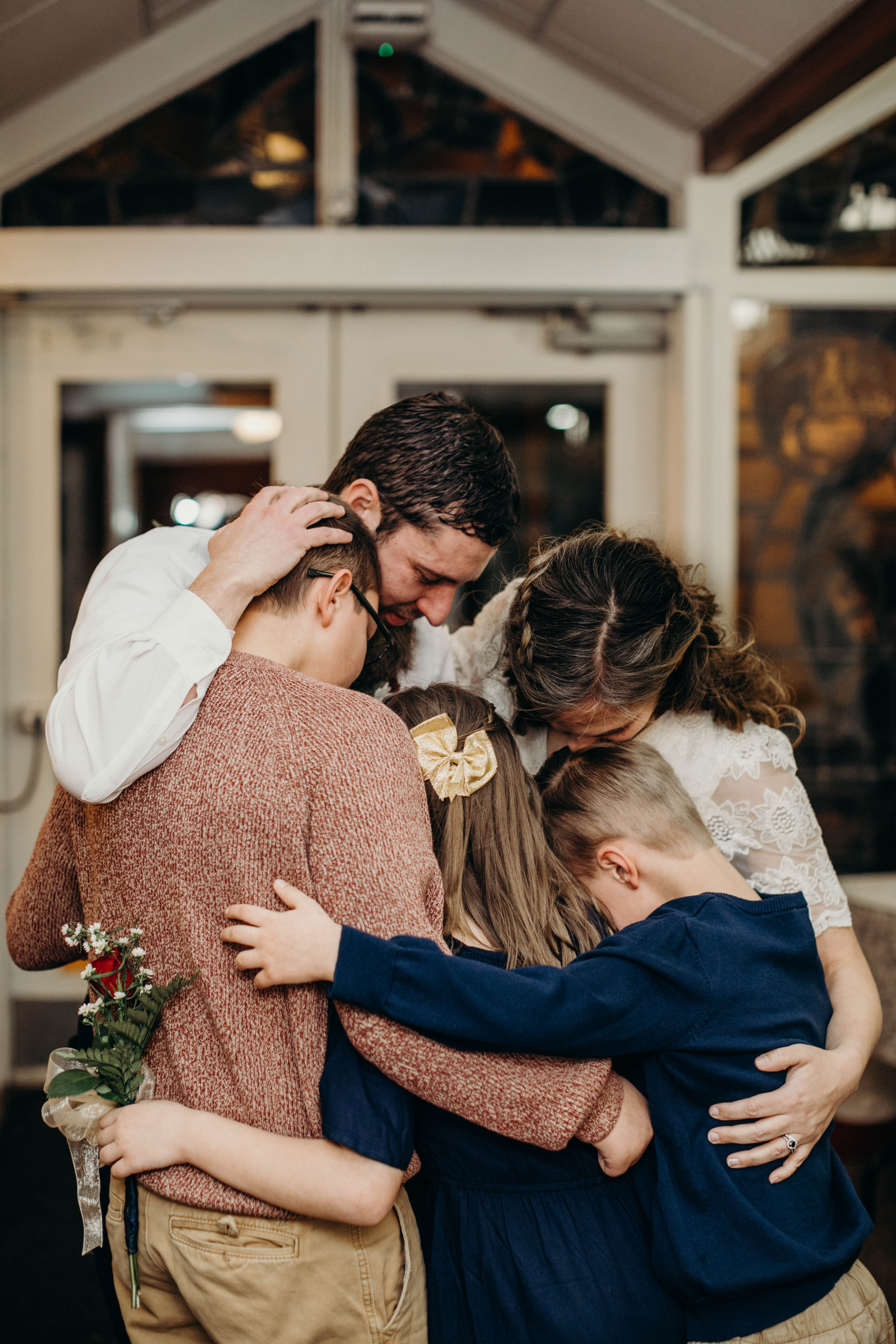  Little Avery can't be seen, because she's being lovingly squished in the epicenter of the family hug. &lt;3 