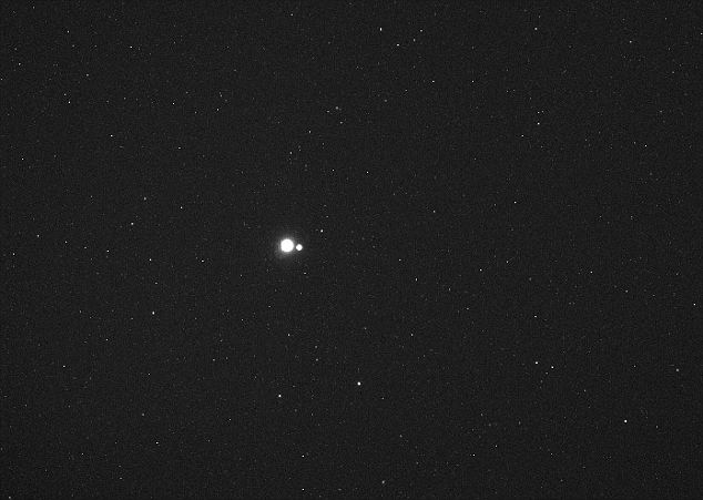 The Earth and Moon from 114 Million Miles away via NASA's MESSENGER spacecraft orbiting Mercury.