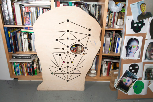 A template of facial recognition points and documentation for Oursler’s current exhibition. Photo: Sarah Trigg