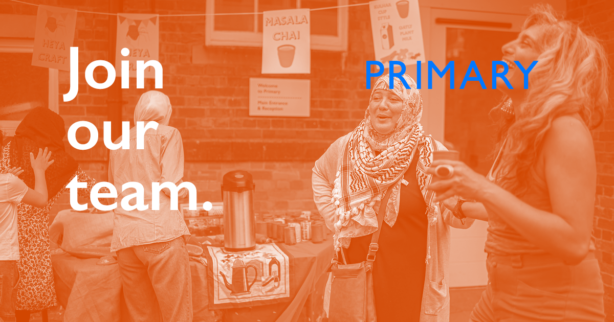 An orange-tinted photograph of people gathered at an outdoor event at Primary forms the background. White text overlaid on the image reads: “Join our team”.