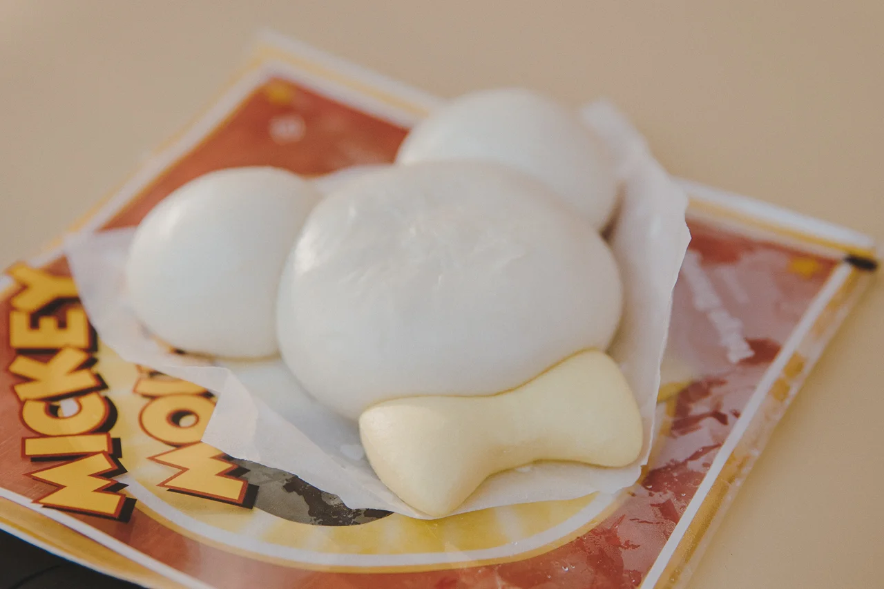 This Mickey Mouse steamed bao filled pork & teriyaki chicken can be found at the Boiler Room in Adventureland. Three buns are great for sharing.