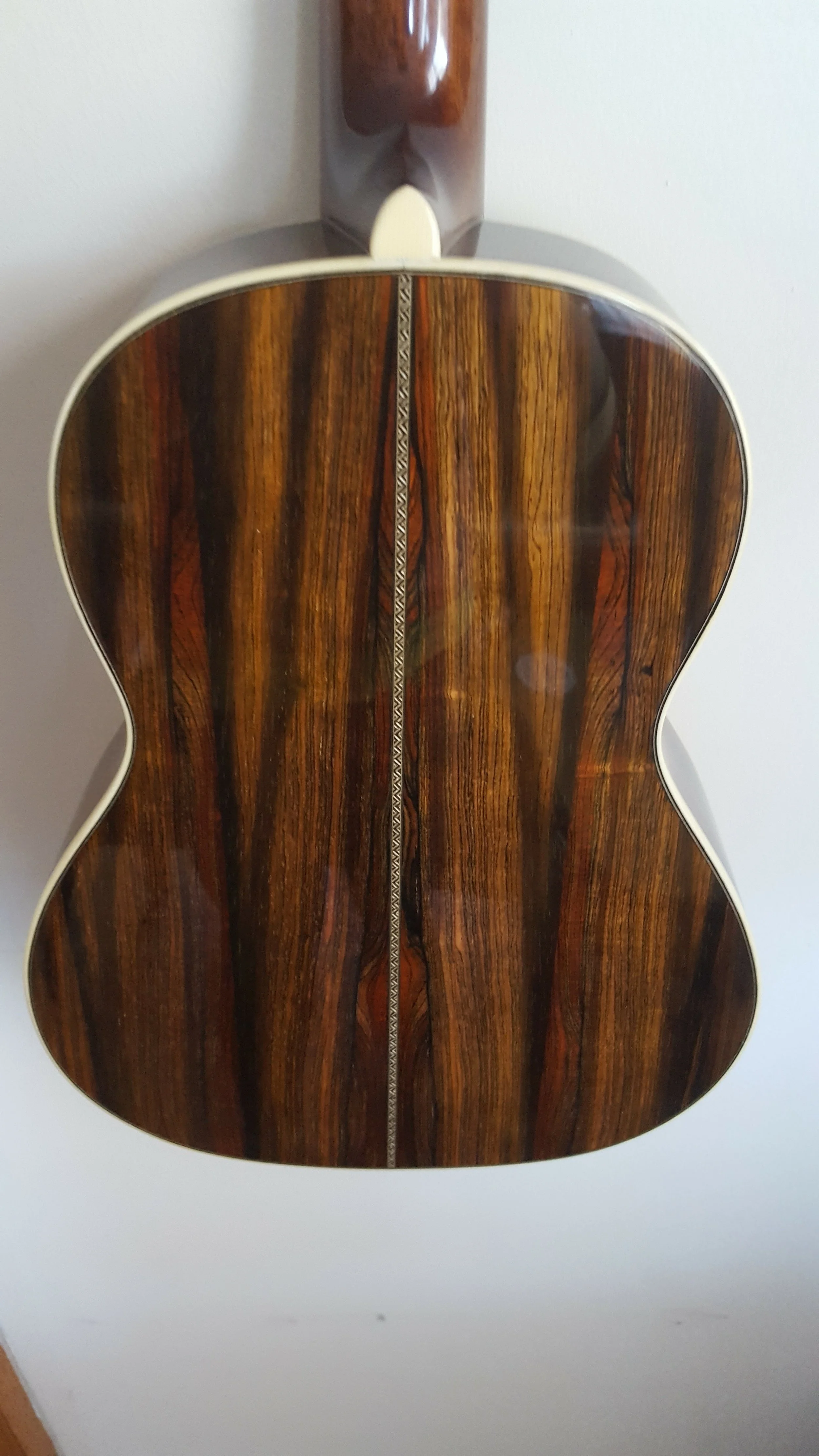 Brazilian rosewood from a 2x2" plank salvaged from a factory manufacturing pool cue sticks and Porche shifter knobs. 