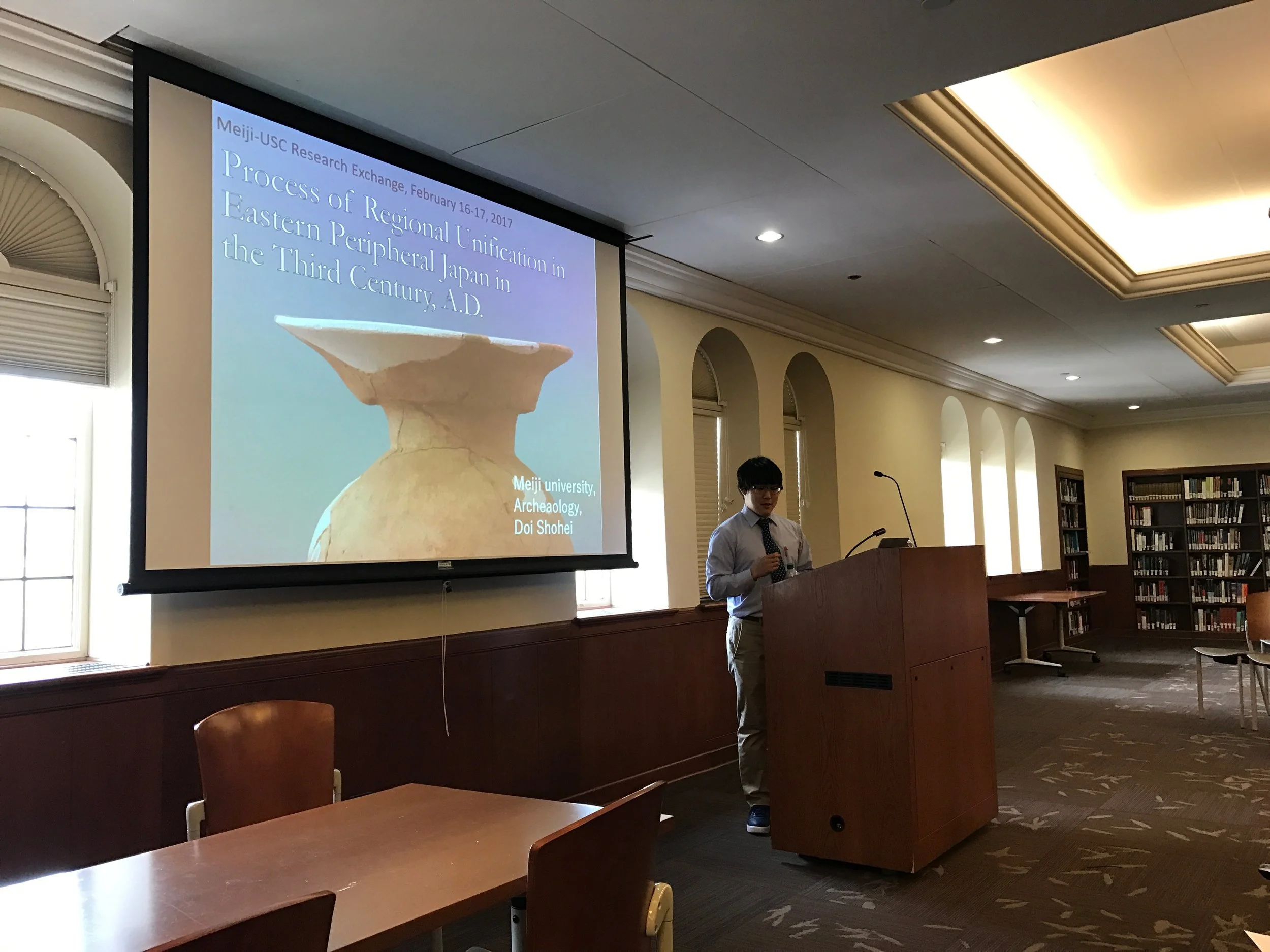 Graduate students from Meiji University, Doi Shôhei and Satô Kenri test their mettle, presenting their papers in English.