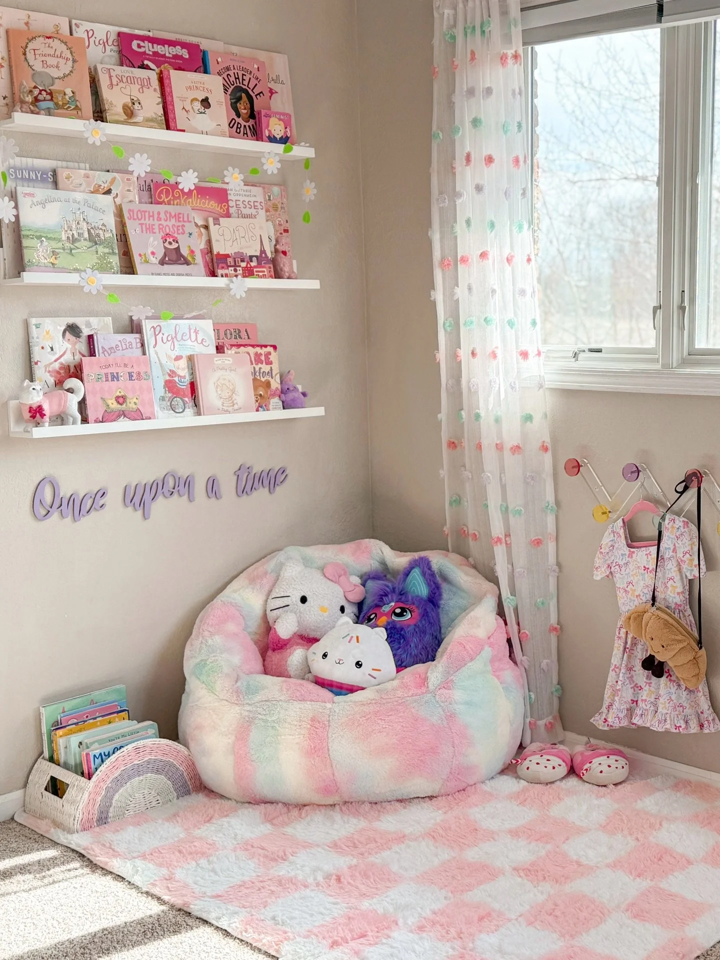 Rowie&rsquo;s reading corner got a fun upgrade! She was obsessed with the checkered rug I got for Galentine&rsquo;s and asked for one for her room! We decided on this cute peachy pink color and it looks so cute in her room. Matches the poms in her cu