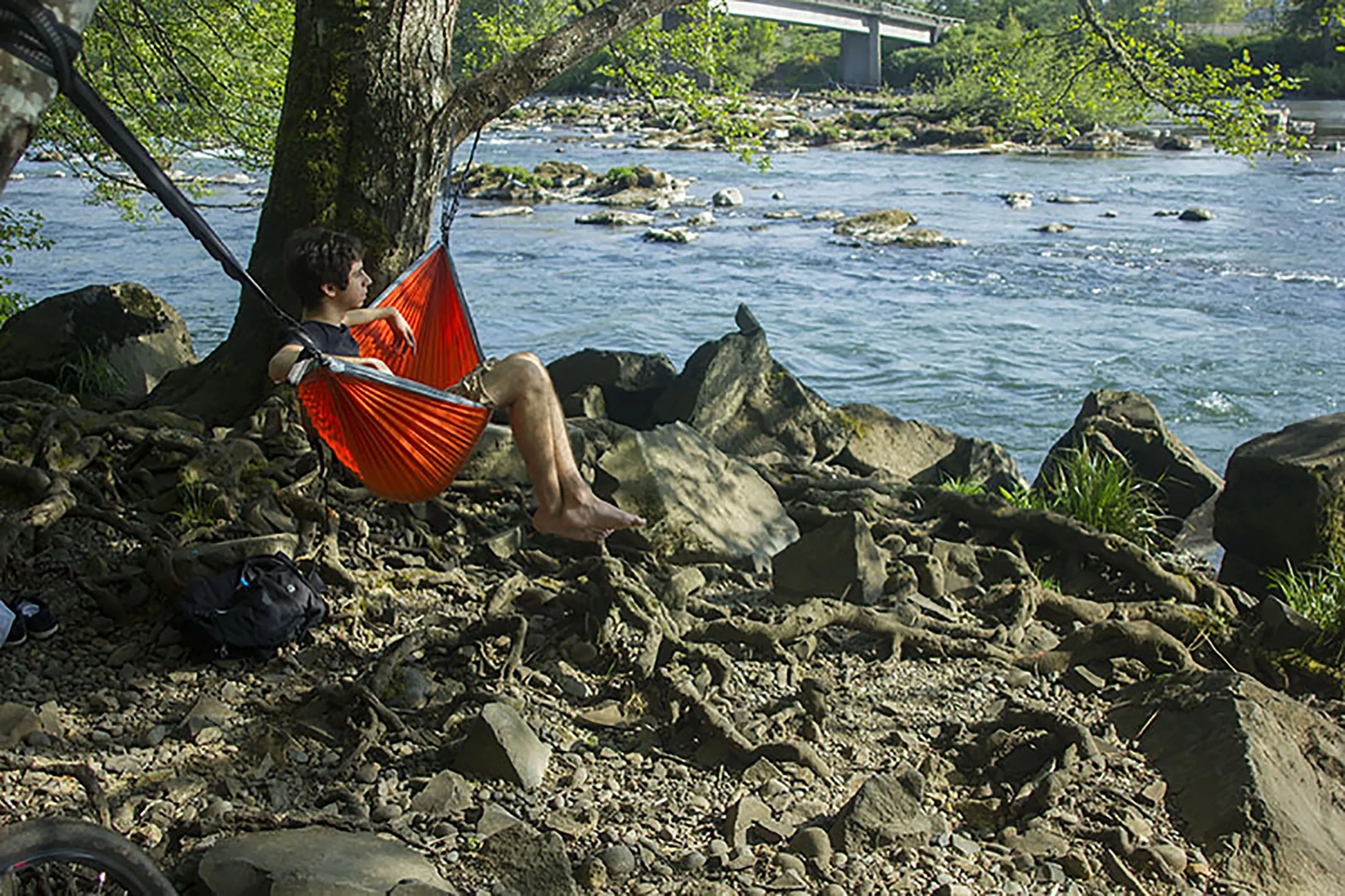  Gilad Touboul, 19, is using his birthday present to relax by the Willamette River.&nbsp; 
