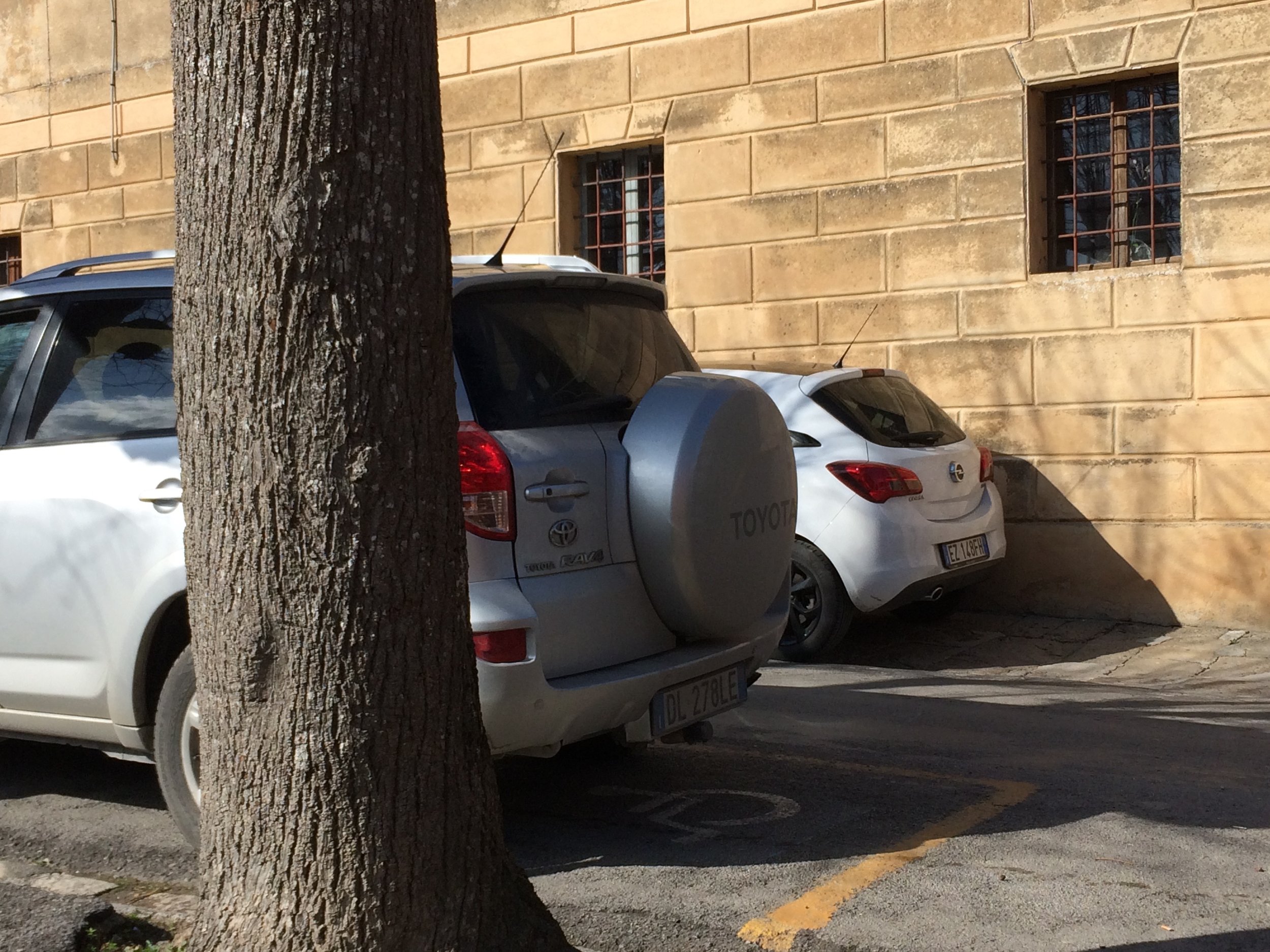 "Can I get through these two cars?"