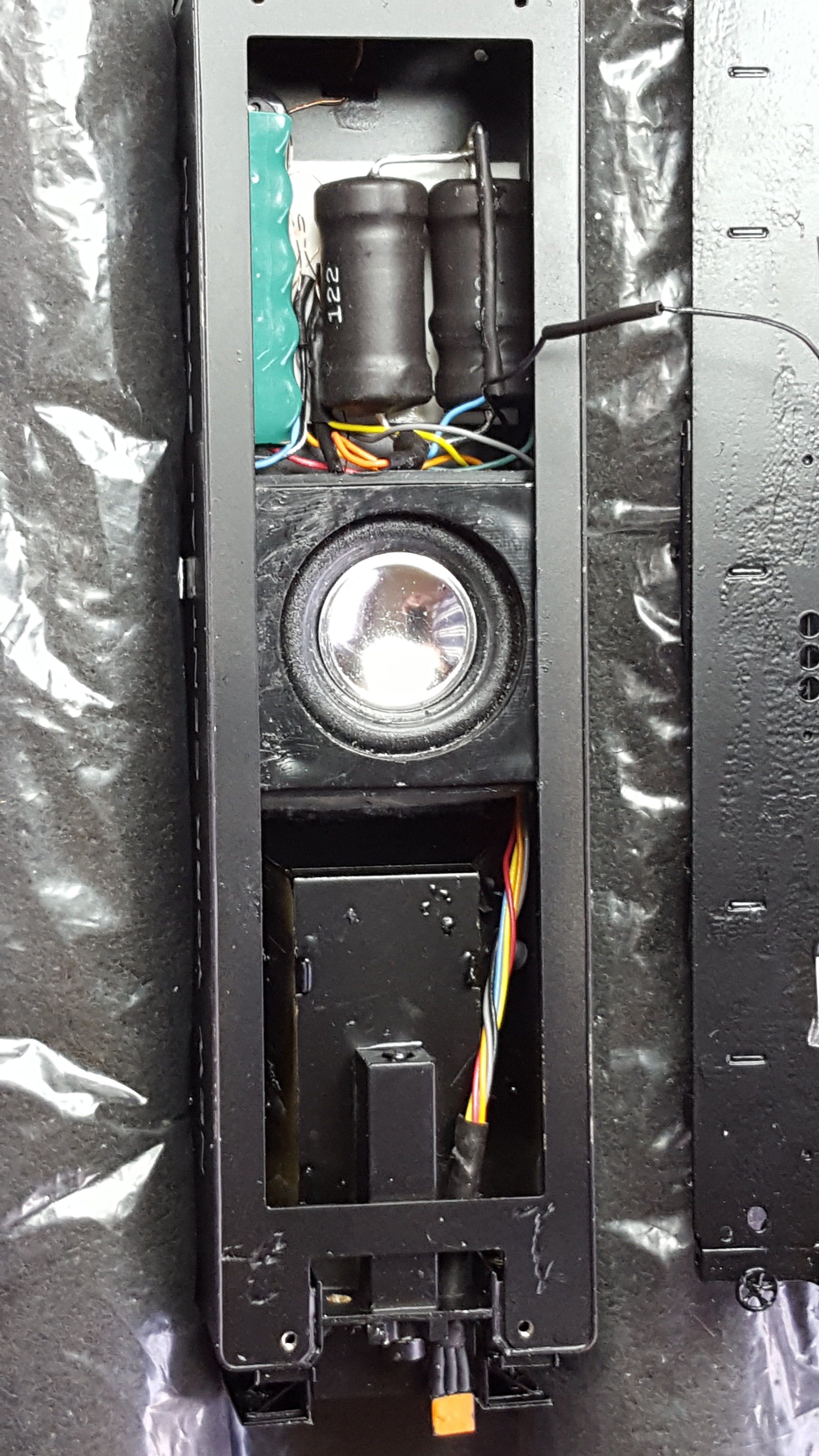 Woofer with cross over network mounted in tender