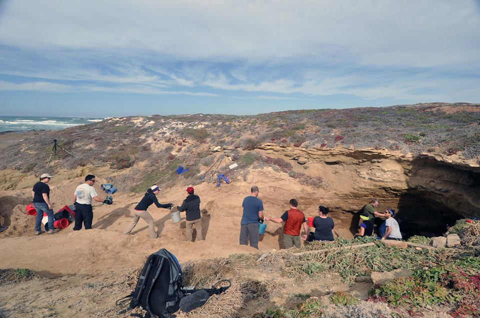 A bucket brigade of Cal State Los Angeles students moved 40,000 buckets of sand to excavate the Lone Woman’s cave in 2012