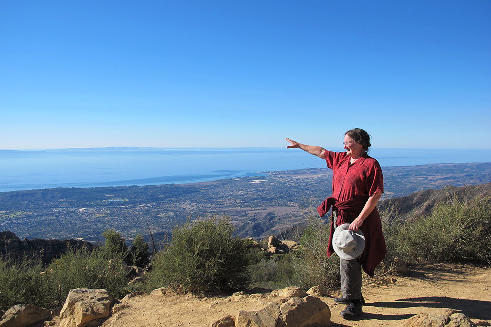Tanya Atwater in Santa Barbara pointing to the northern Channel Islands