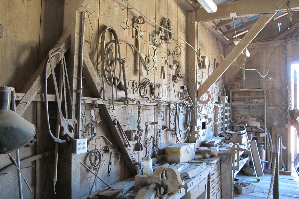 The ranch workshop, inside the red barn, looks operational although it was abandoned decades ago