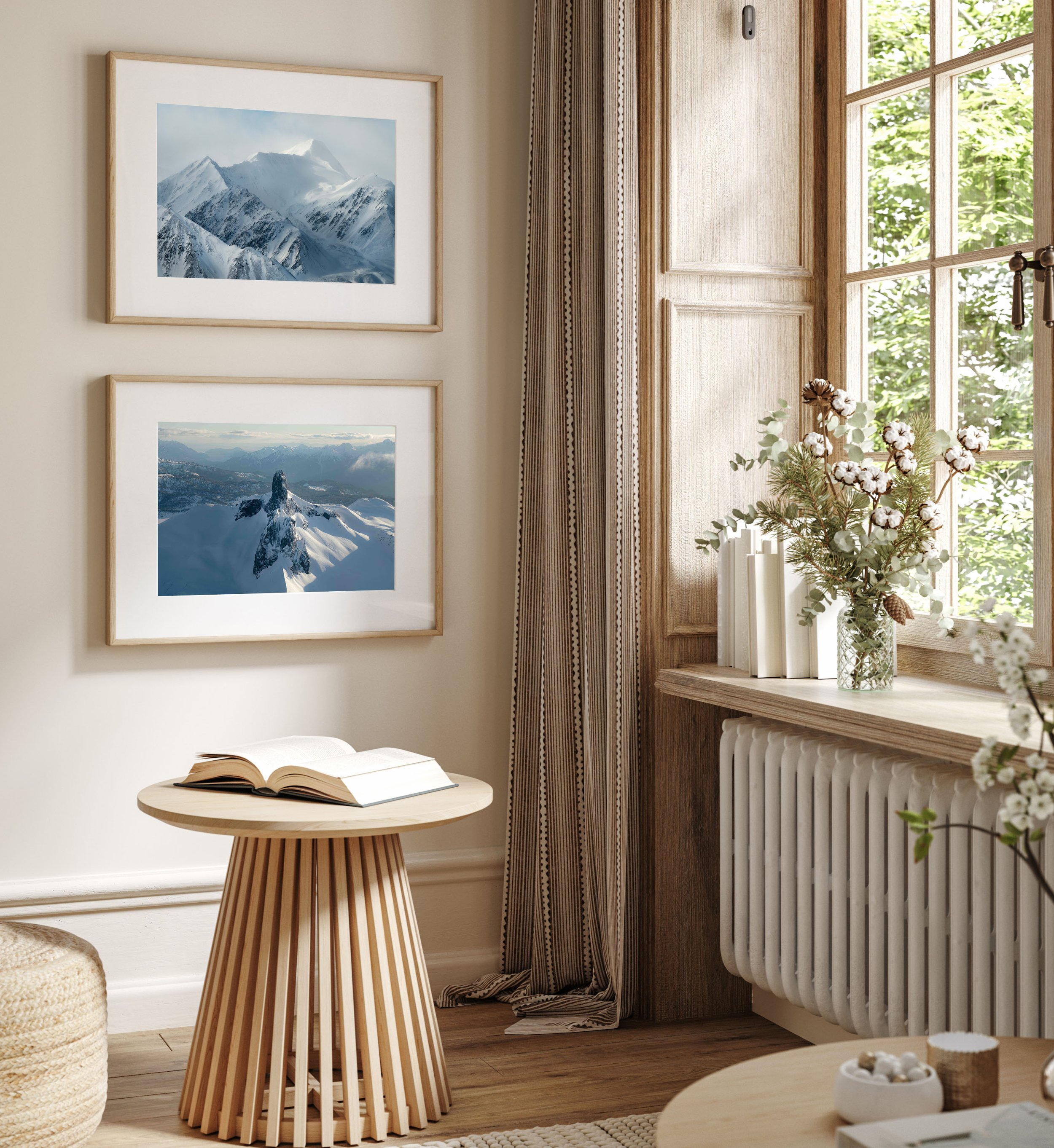 Pair of mountain scenes in medium frames in warm home - Two mountain-themed prints showcased in medium-sized frames, adding warmth to a home interior