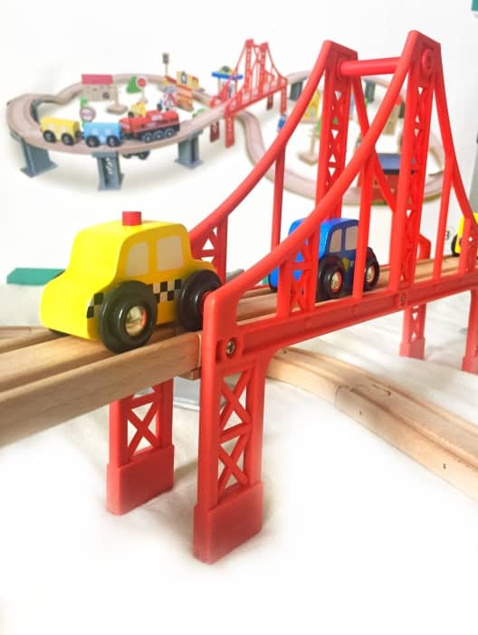 Evoking childhood nostalgia, this elaborate train set comes with 70 premium wooden pieces.