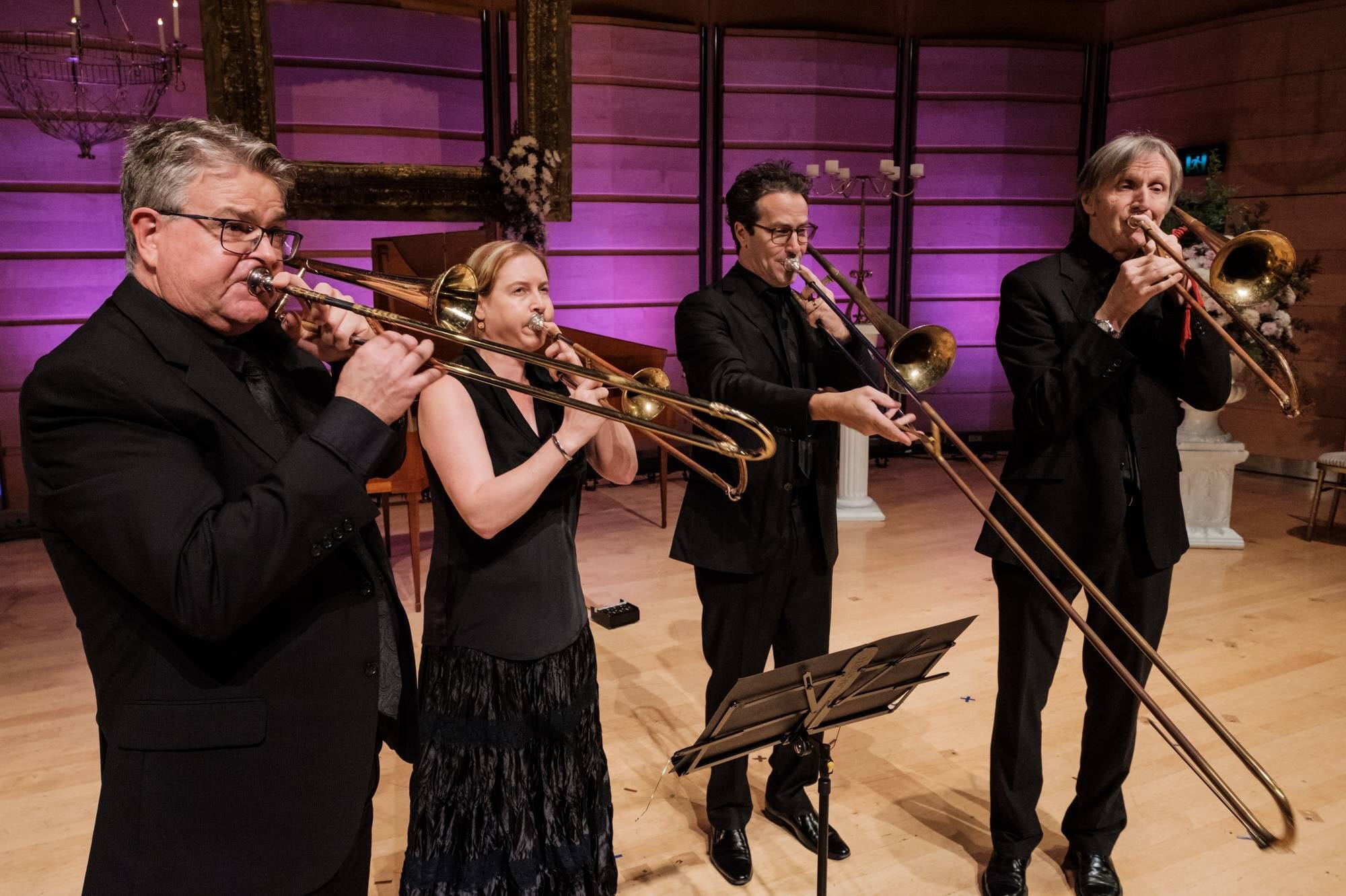  Our trombone section began the concert with Beethoven's Equals for four trombones. (L-R) Scott Kinmont, Ros Jorgenson, Brett Page and Nigel Crocker    Robert Catto, Photographer  Stage design  James Browne Presents  